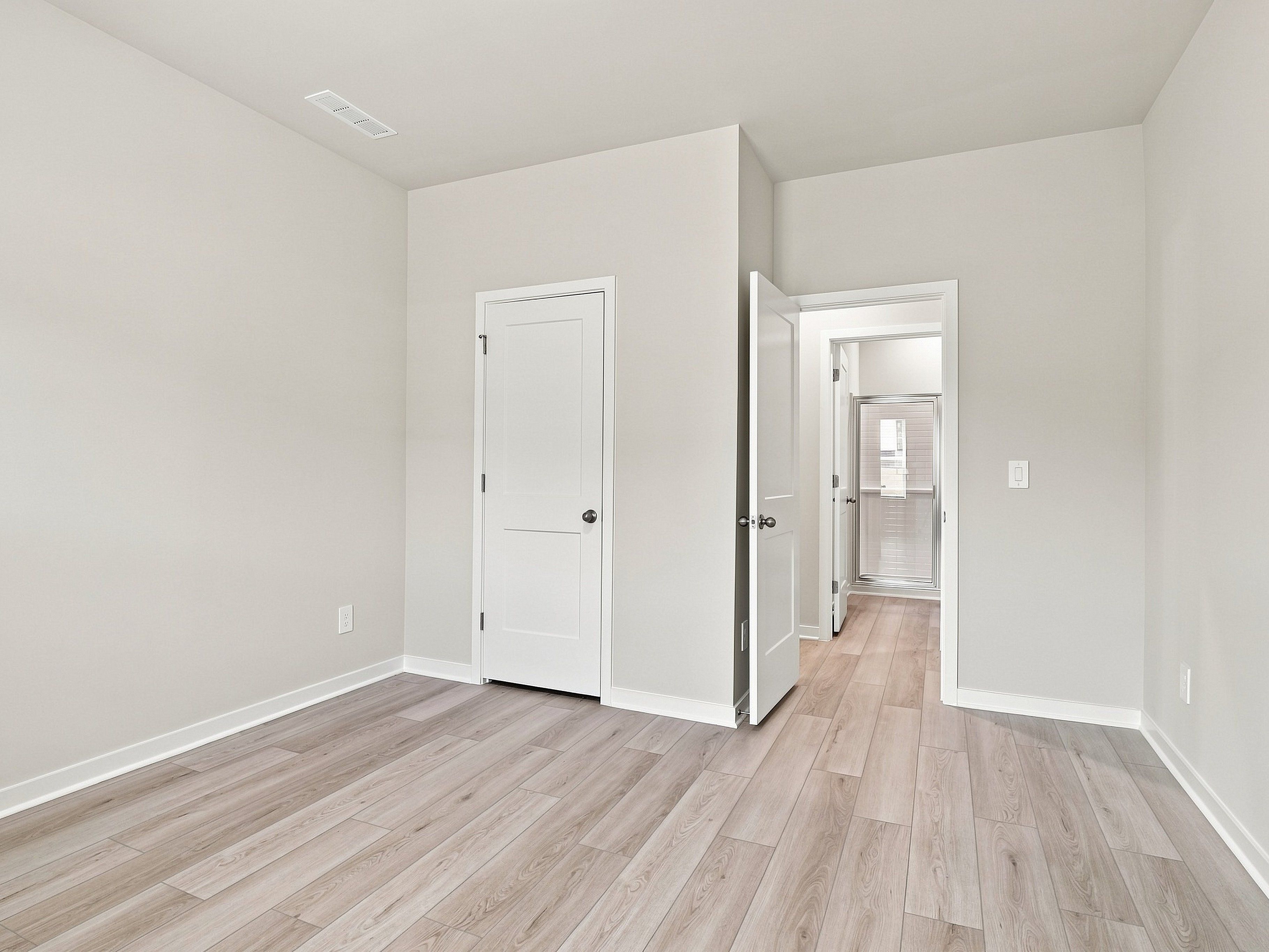 Secondary bedroom in the Paisley floorplan at a Meritage Homes community in Durham, NC.