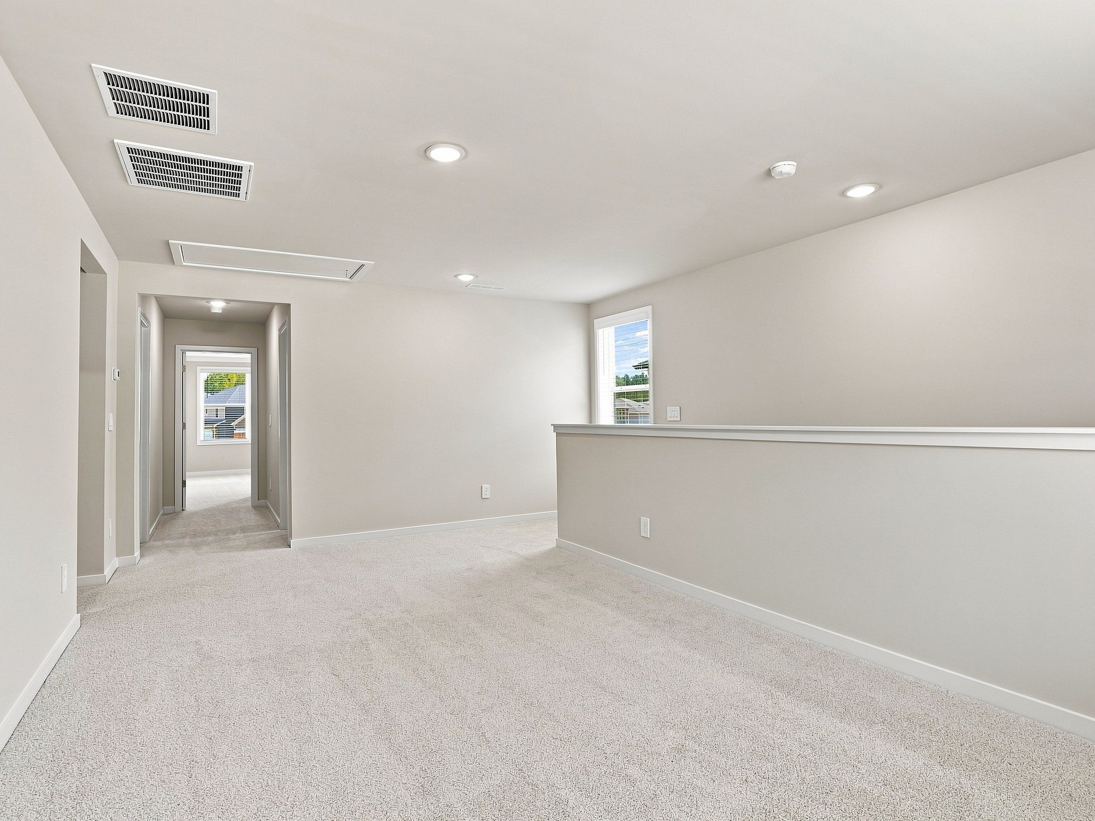 Secondary bedroom in the Paisley floorplan at a Meritage Homes community in Durham, NC.