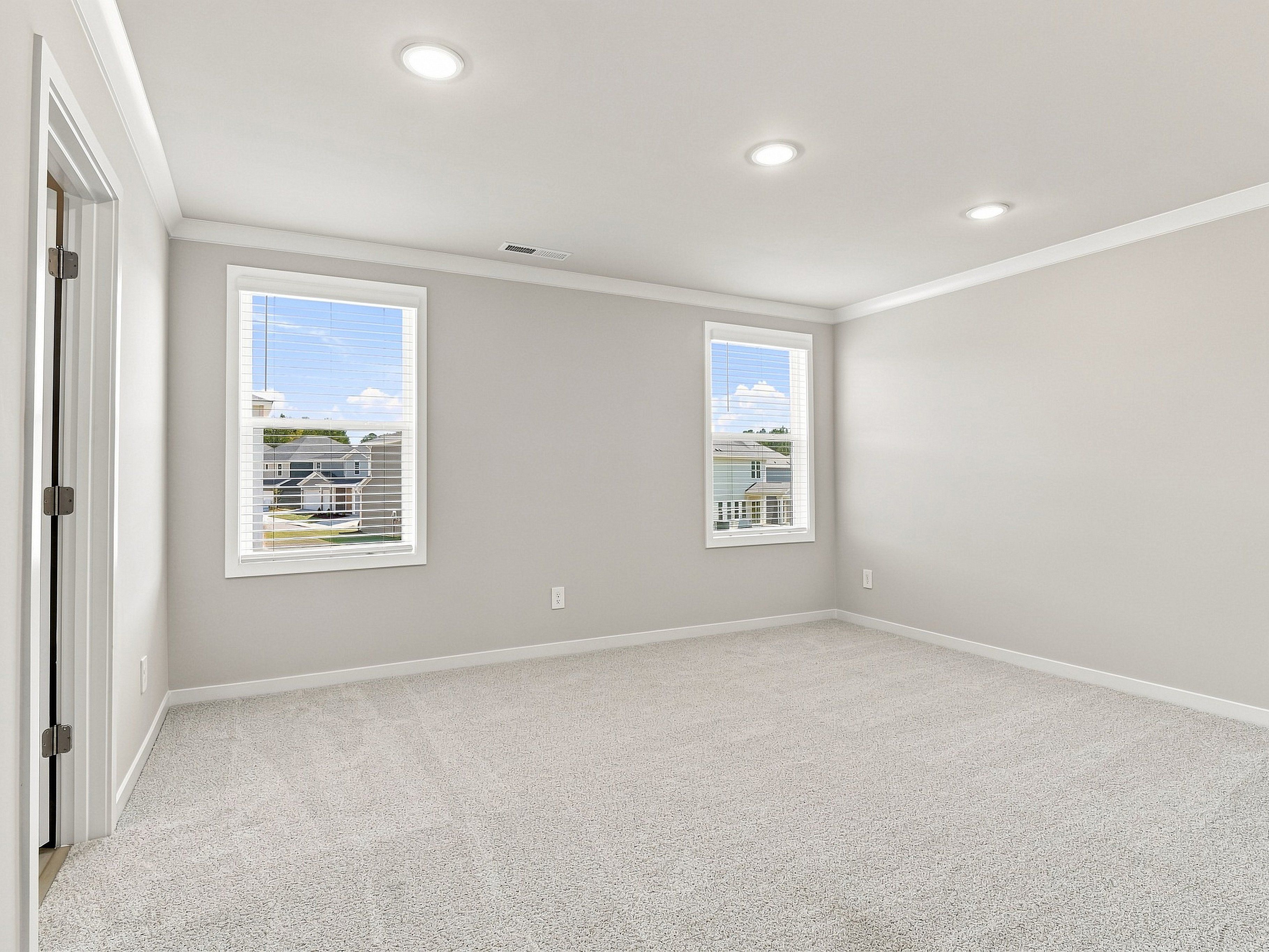 Primary bedroom in the Paisley floorplan at a Meritage Homes community in Durham, NC.
