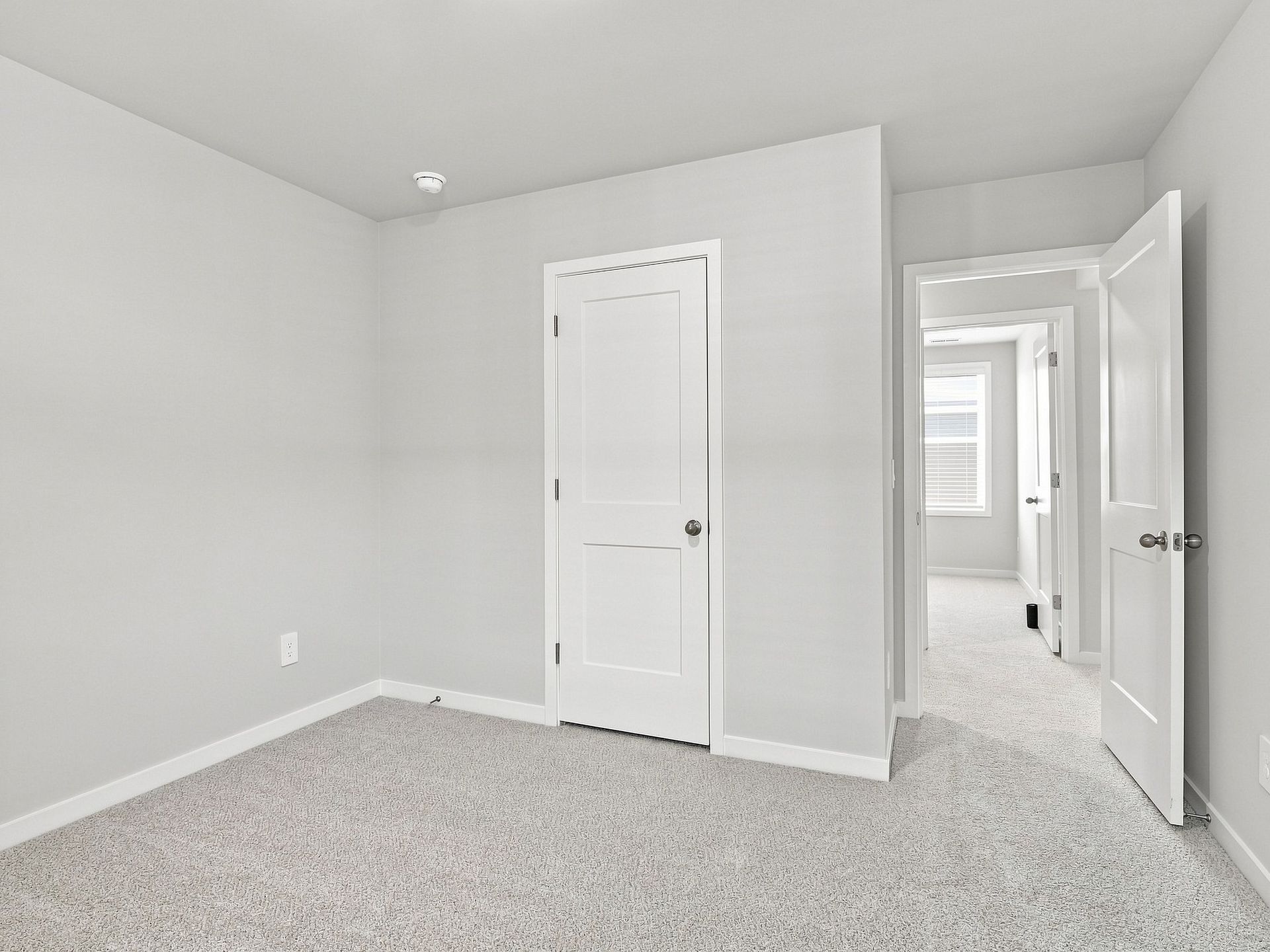 Secondary bedroom in the Paisley floorplan at a Meritage Homes community in Durham, NC.