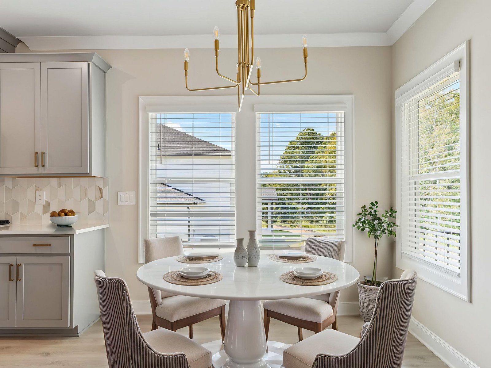The Modern Glam Stone interior package modeled at River Pointe.