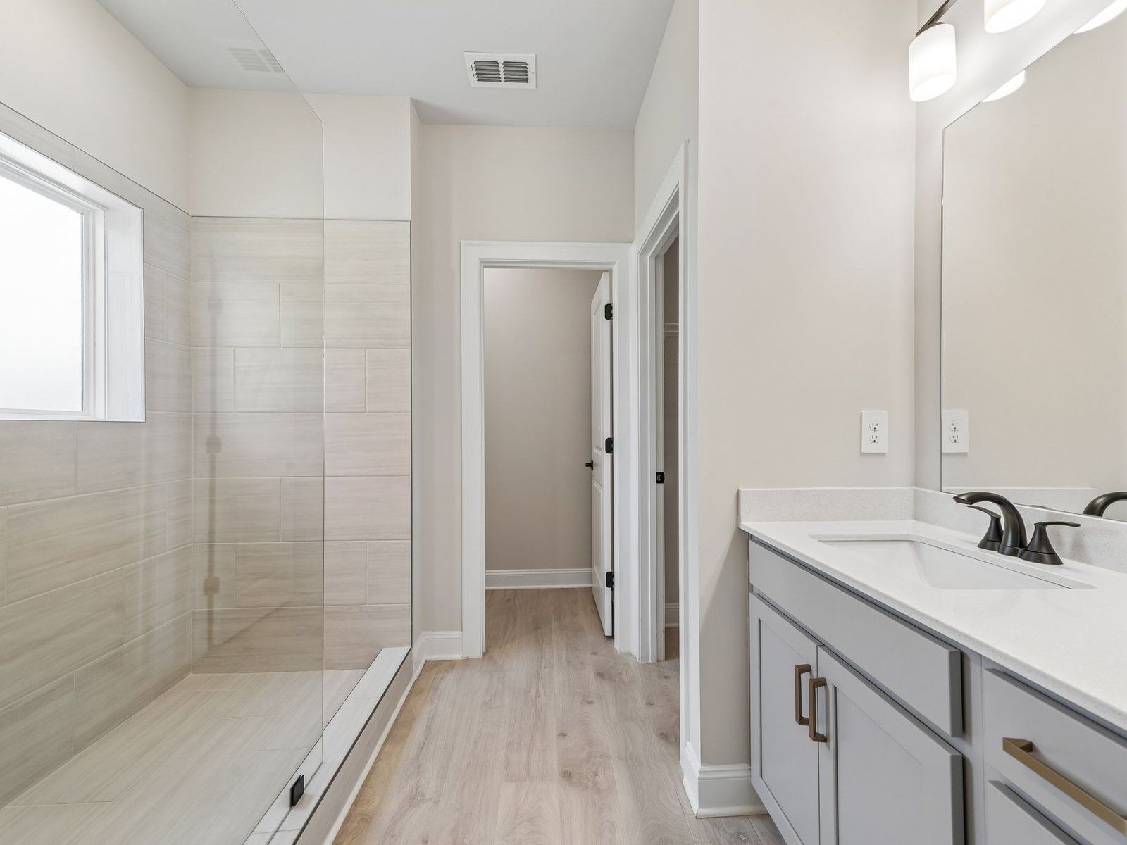 The Modern Glam Stone interior package modeled at River Pointe.