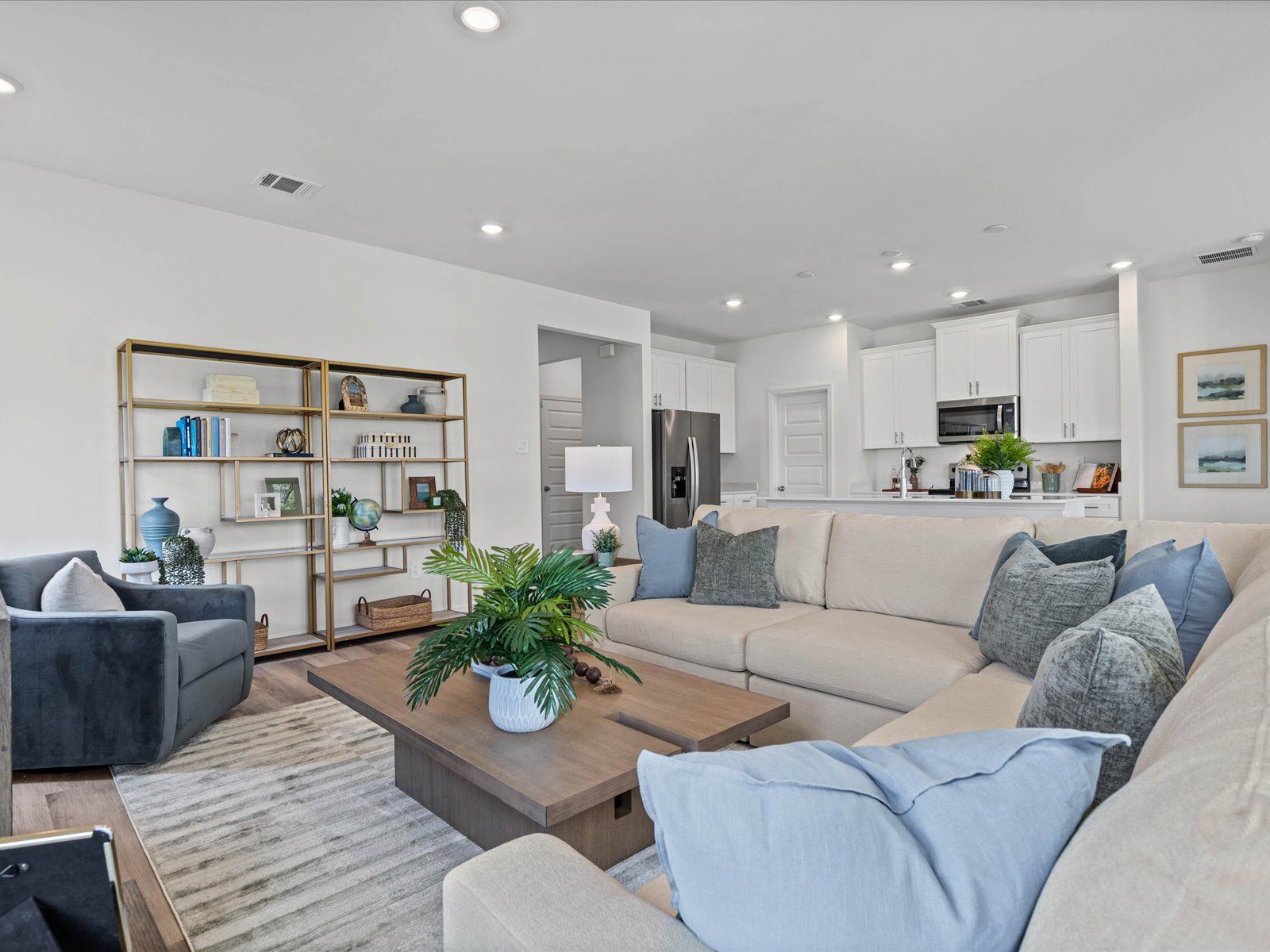 Great room in the Chandler floorplan at a Meritage Homes community in Summerdale, AL.