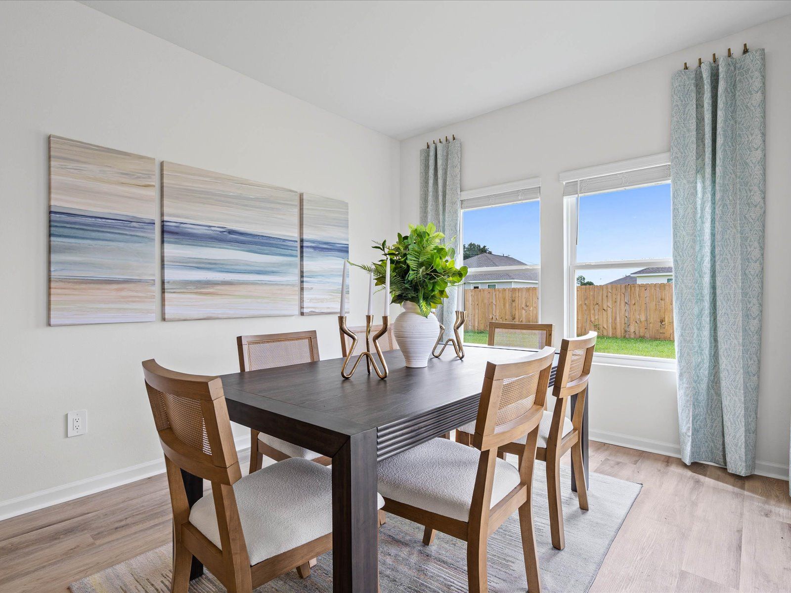 Dining area in the Chandler floorplan at a Meritage Homes community in Summerdale, AL.