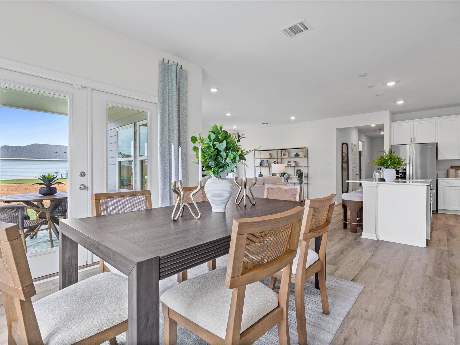 Dining area in the Chandler floorplan at a Meritage Homes community in Summerdale, AL.