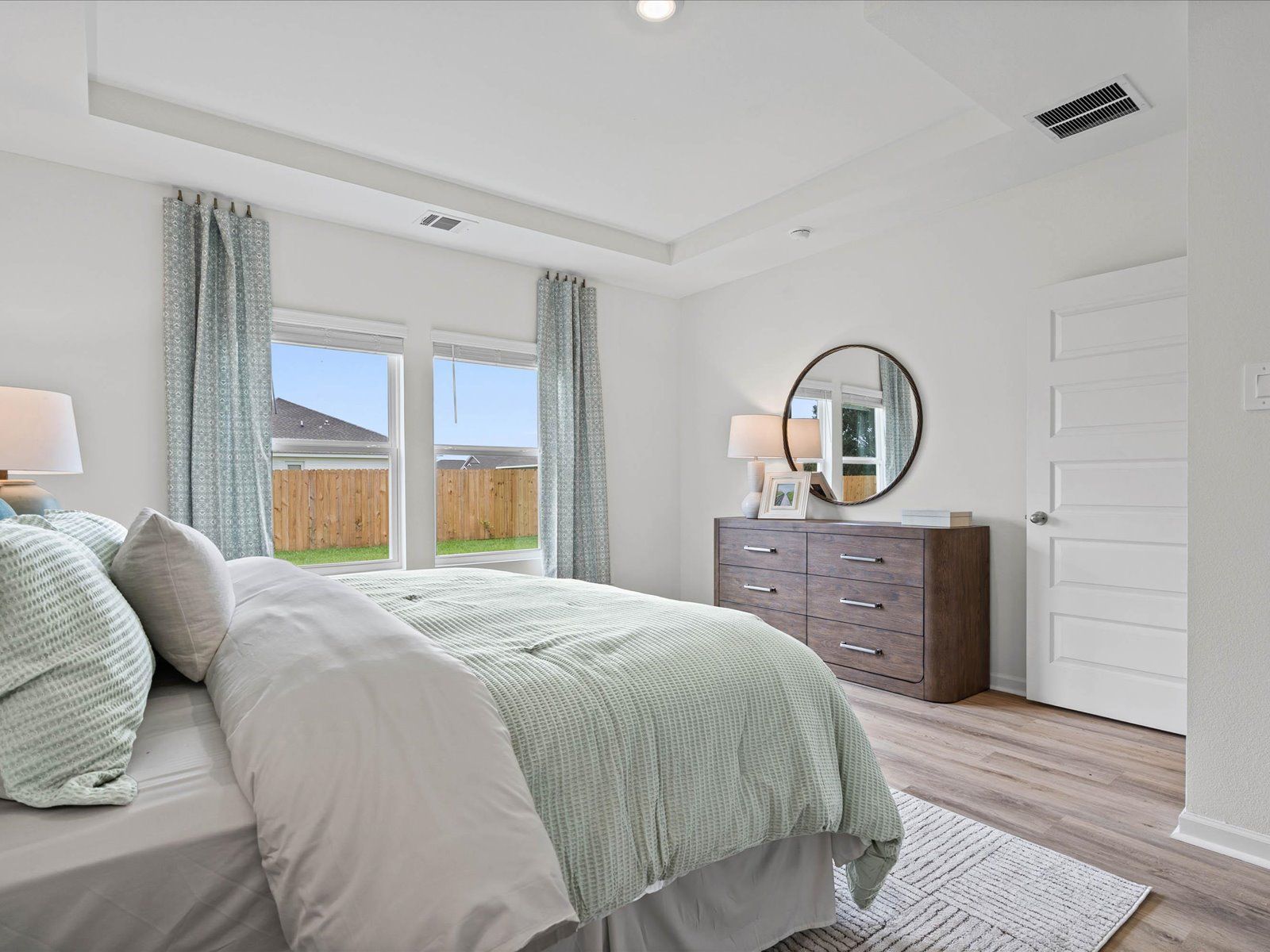 Primary bedroom in the Chandler floorplan at a Meritage Homes community in Summerdale, AL.