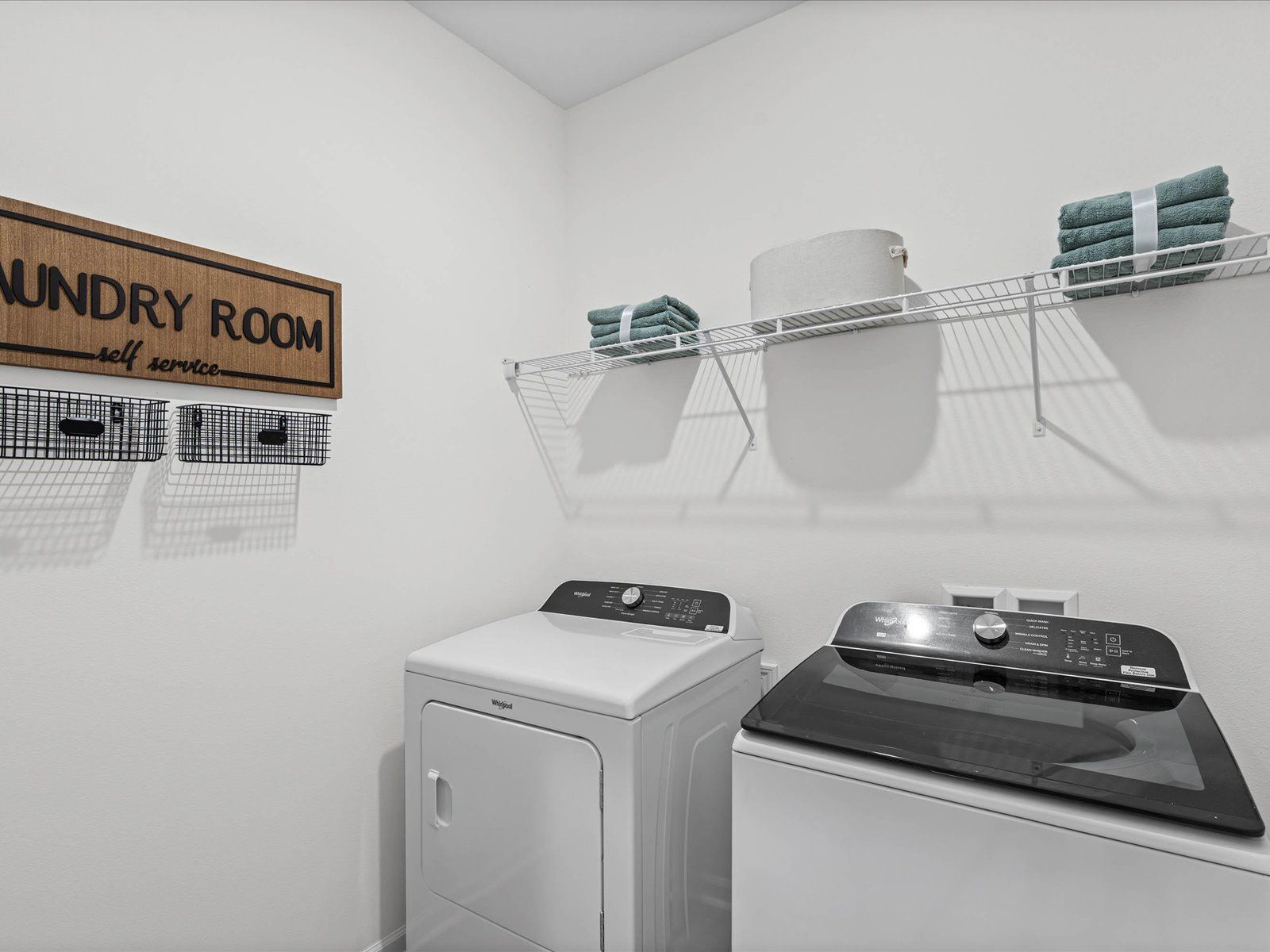 Laundry room in the Chandler floorplan at a Meritage Homes community in Summerdale, AL.