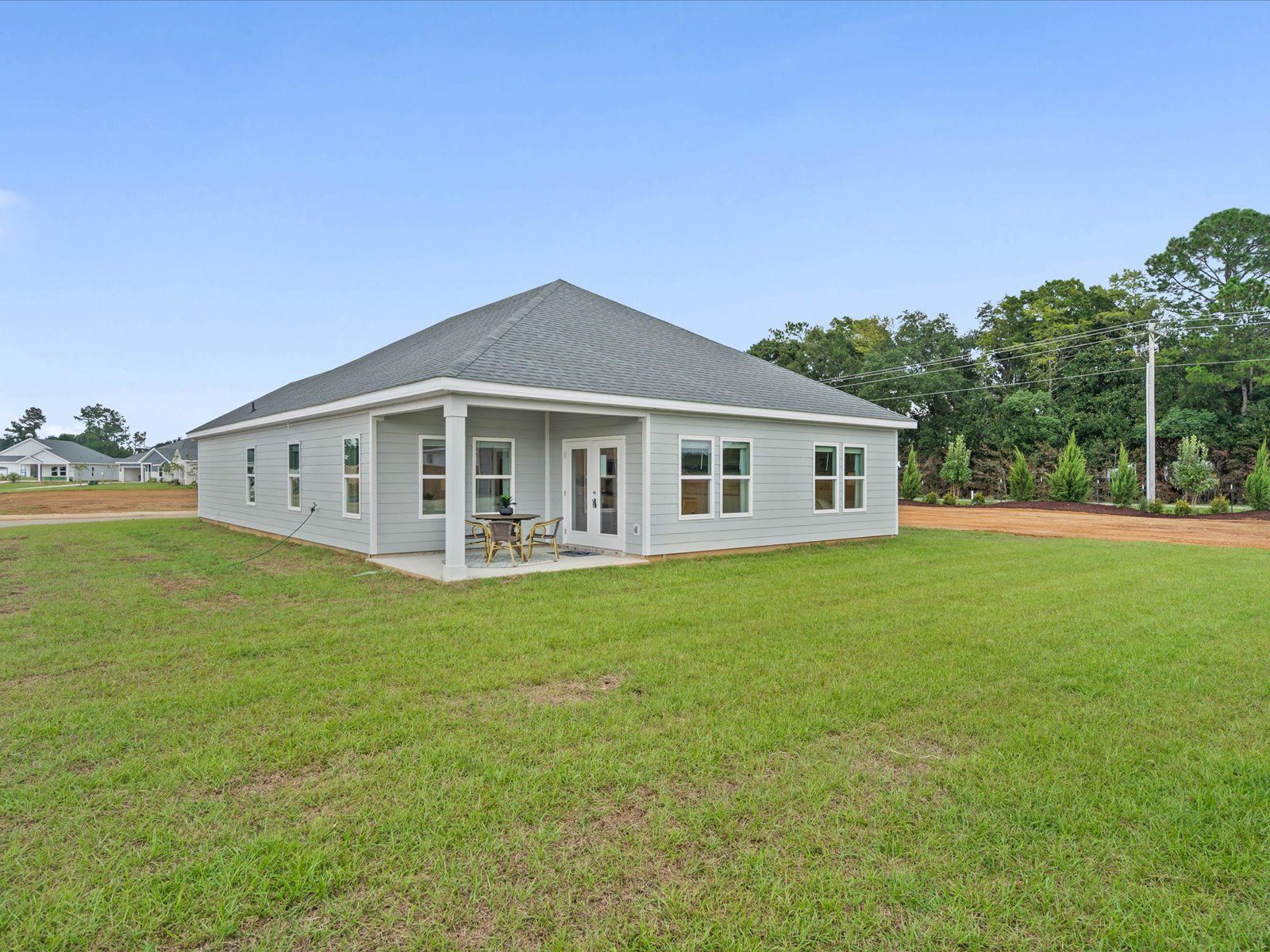 Backyard of the Chandler floorplan at a Meritage Homes community in Summerdale, AL.