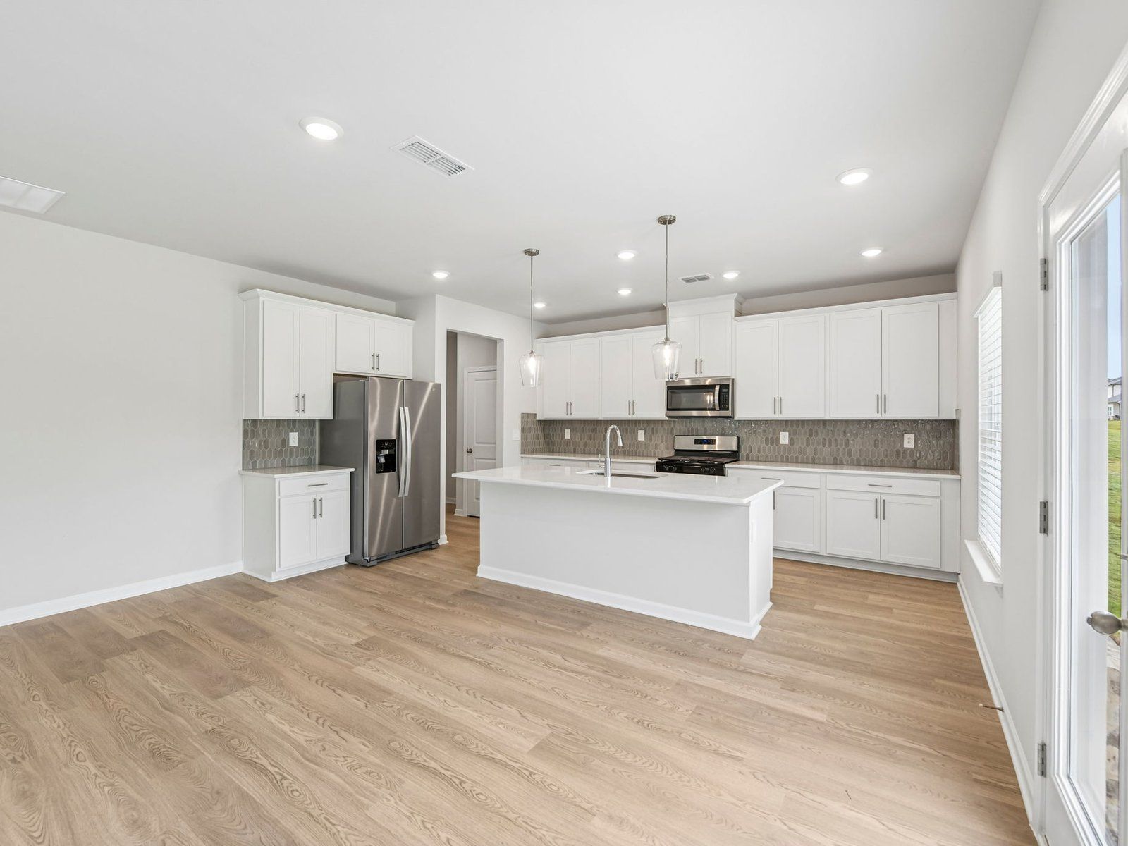 The Taylorsville floorplan with the Lush White interior package.