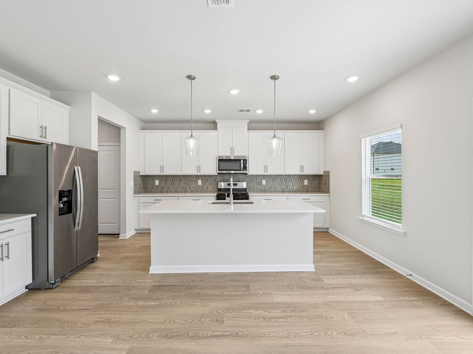 The Taylorsville floorplan with the Lush White interior package.