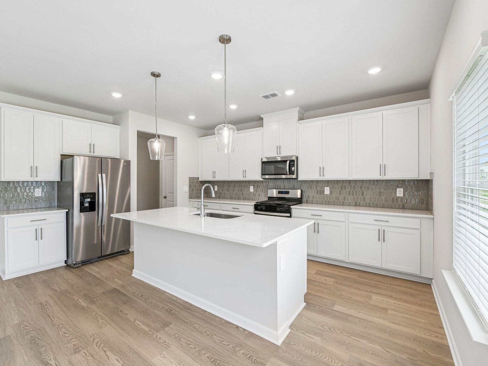 The Taylorsville floorplan with the Lush White interior package.