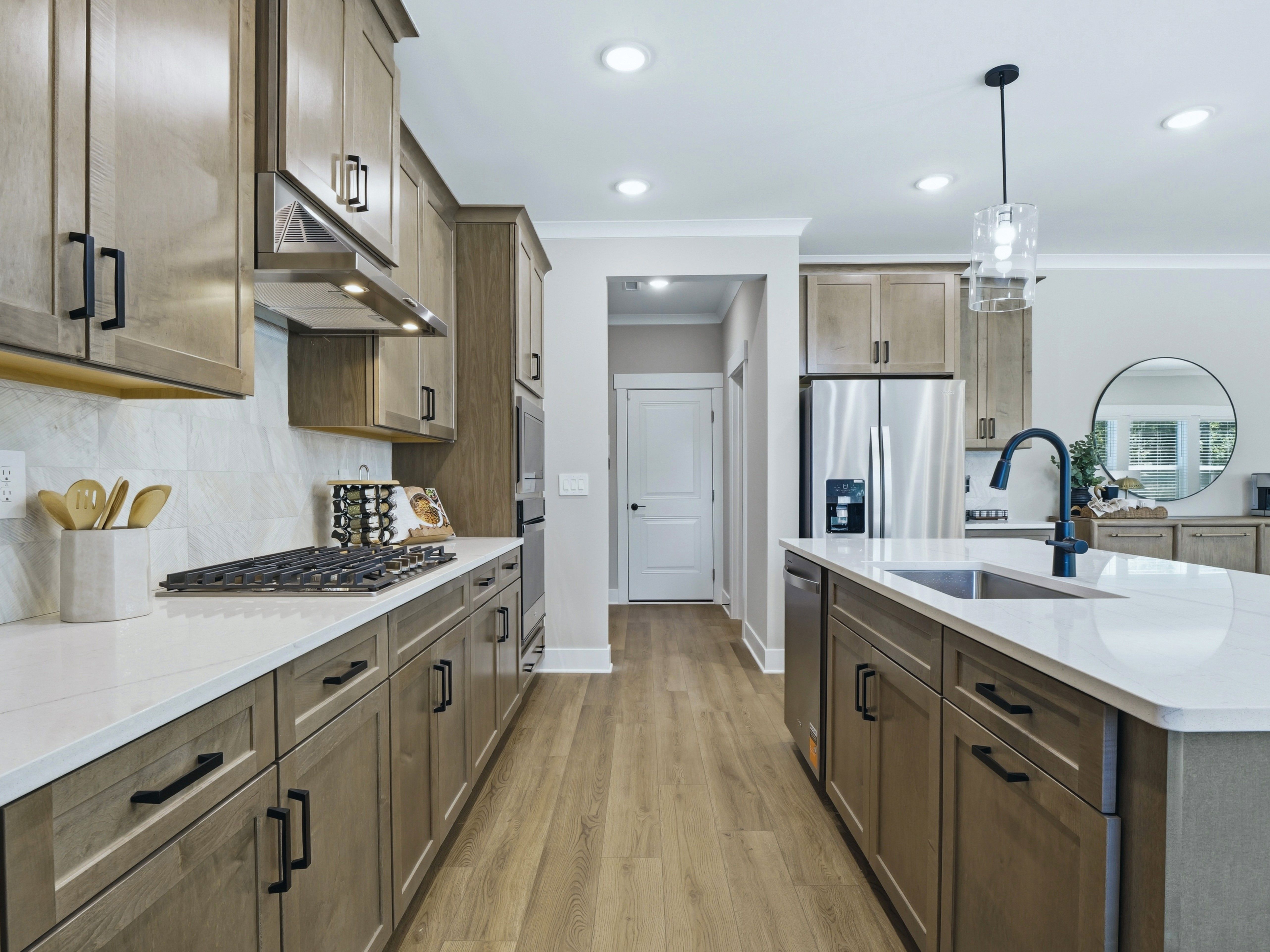 Kitchen in the Taylorsville floorplan at a Meritage Homes community in Zebulon, NC.