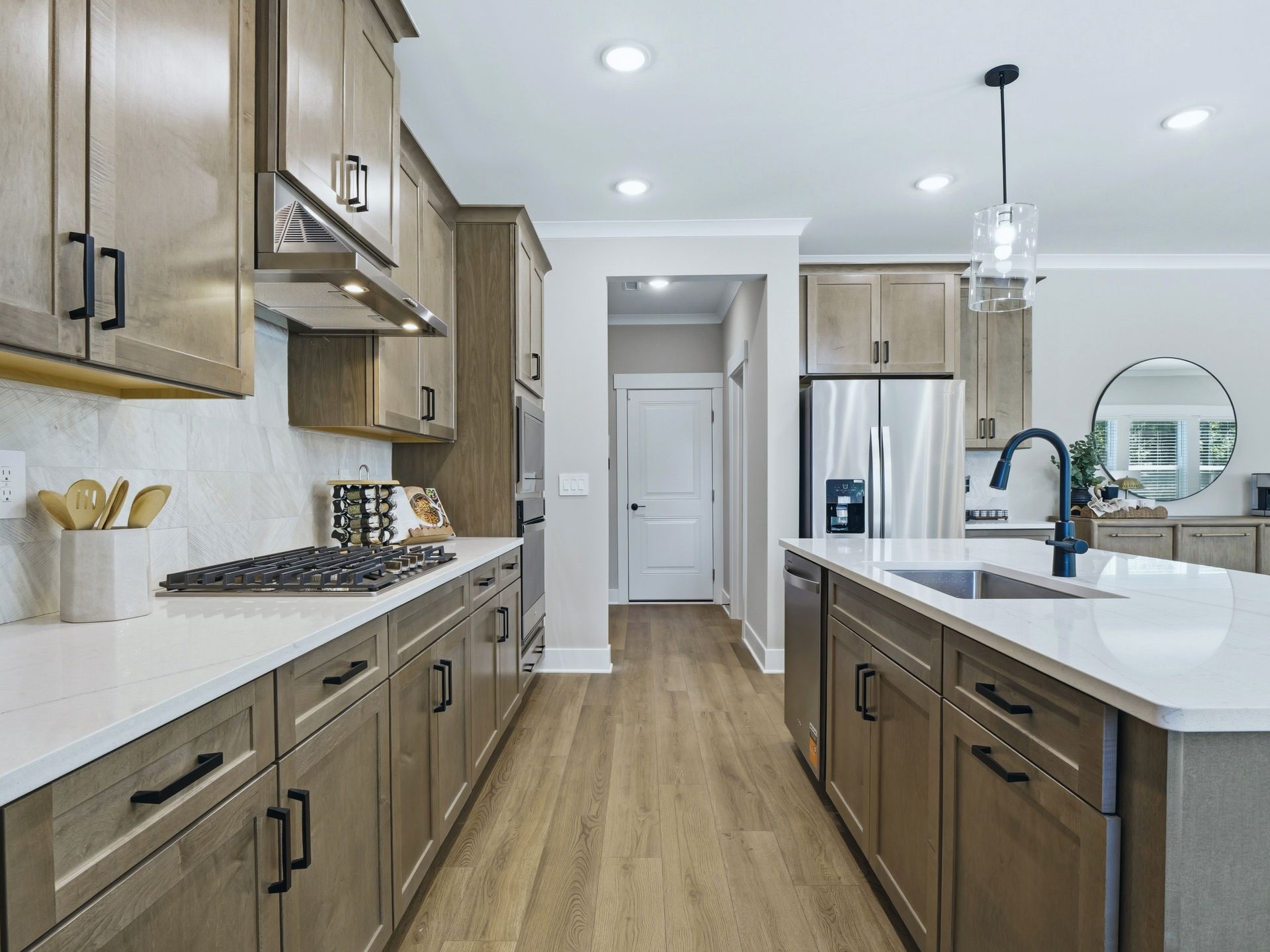 Kitchen in the Taylorsville floorplan at a Meritage Homes community in Zebulon, NC.