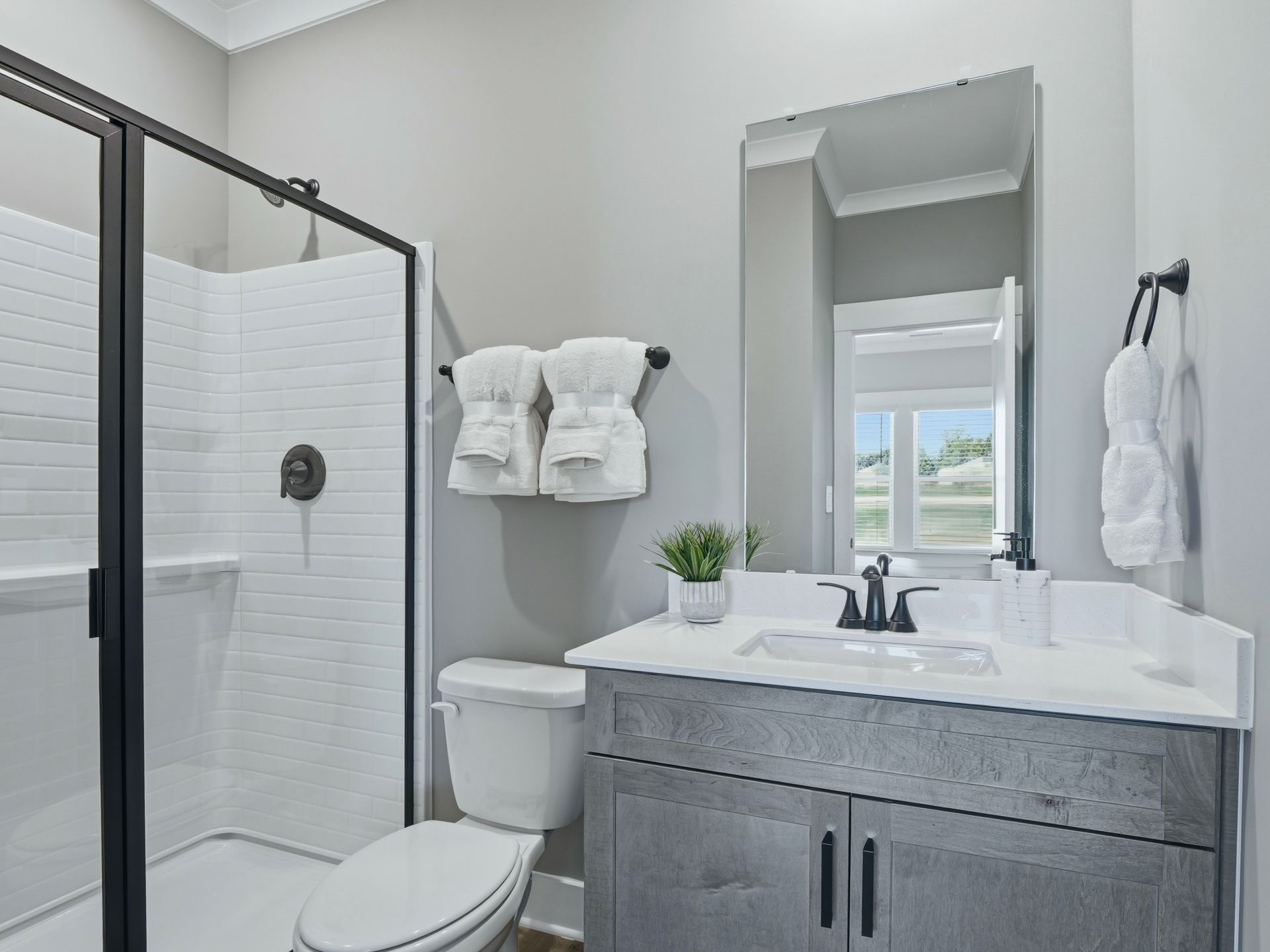 Secondary bathroom in the Taylorsville floorplan at a Meritage Homes community in Zebulon, NC.
