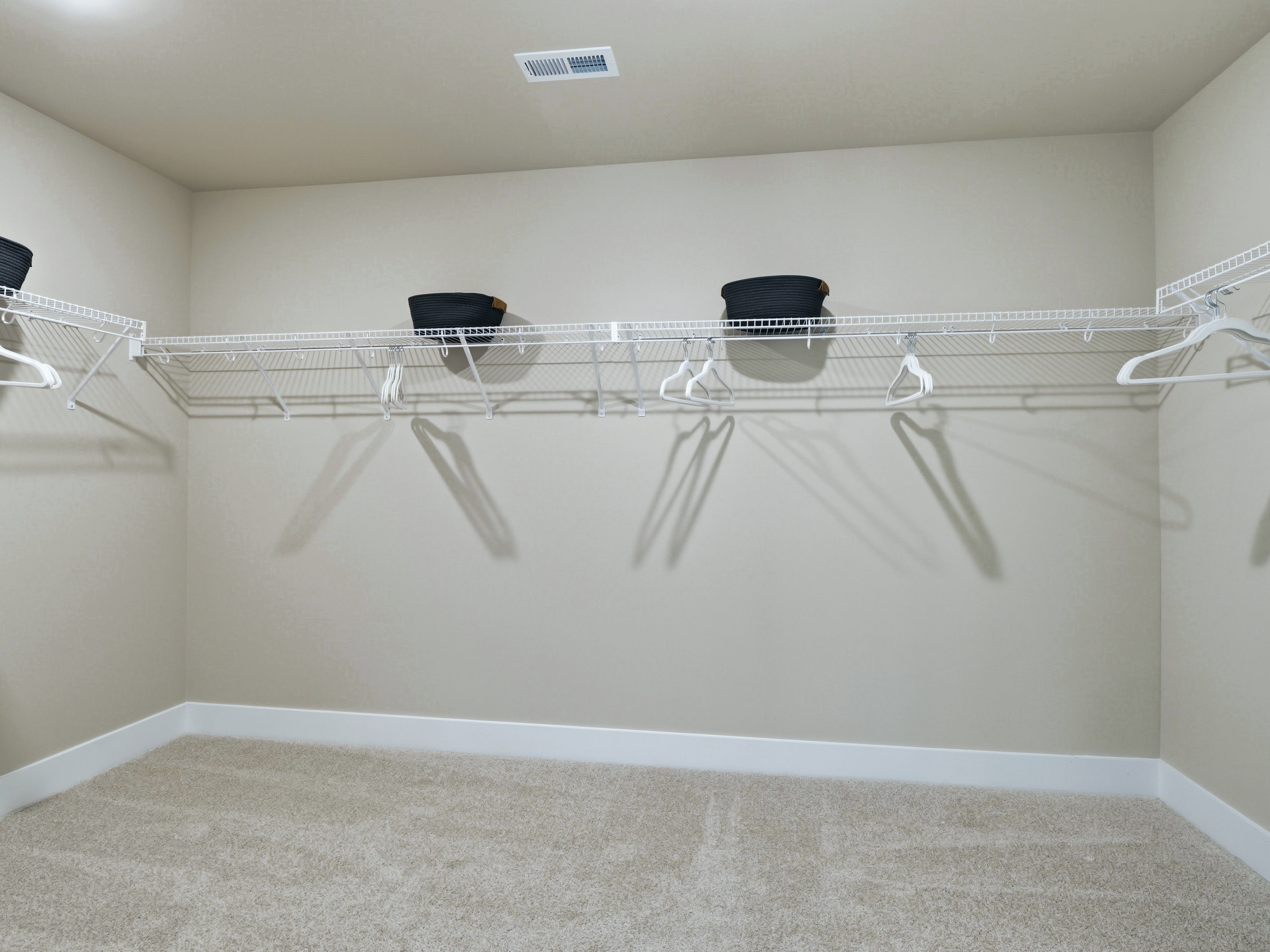 Walk-in closet in the Taylorsville floorplan at a Meritage Homes community in Zebulon, NC.