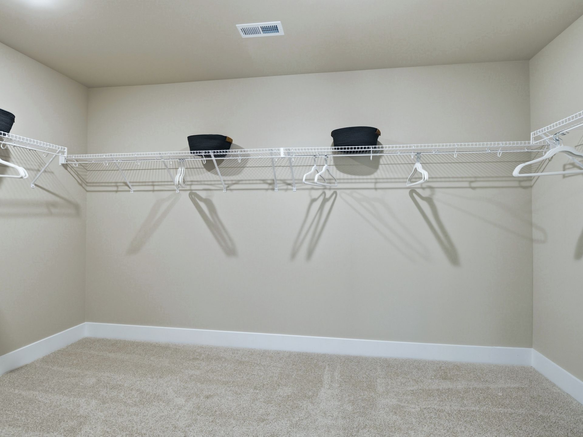 Walk-in closet in the Taylorsville floorplan at a Meritage Homes community in Zebulon, NC.