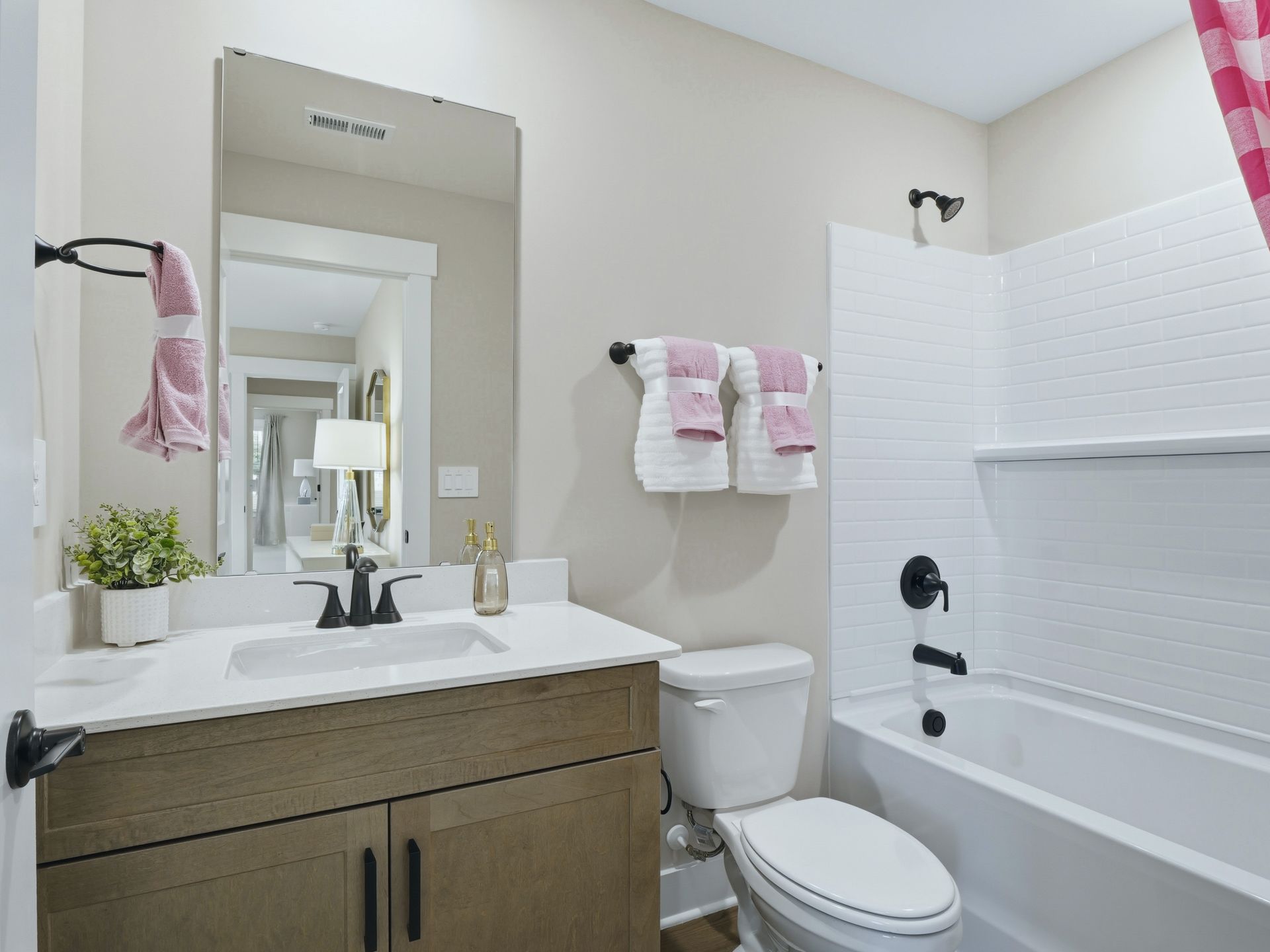 Secondary bathroom in the Taylorsville floorplan at a Meritage Homes community in Zebulon, NC.
