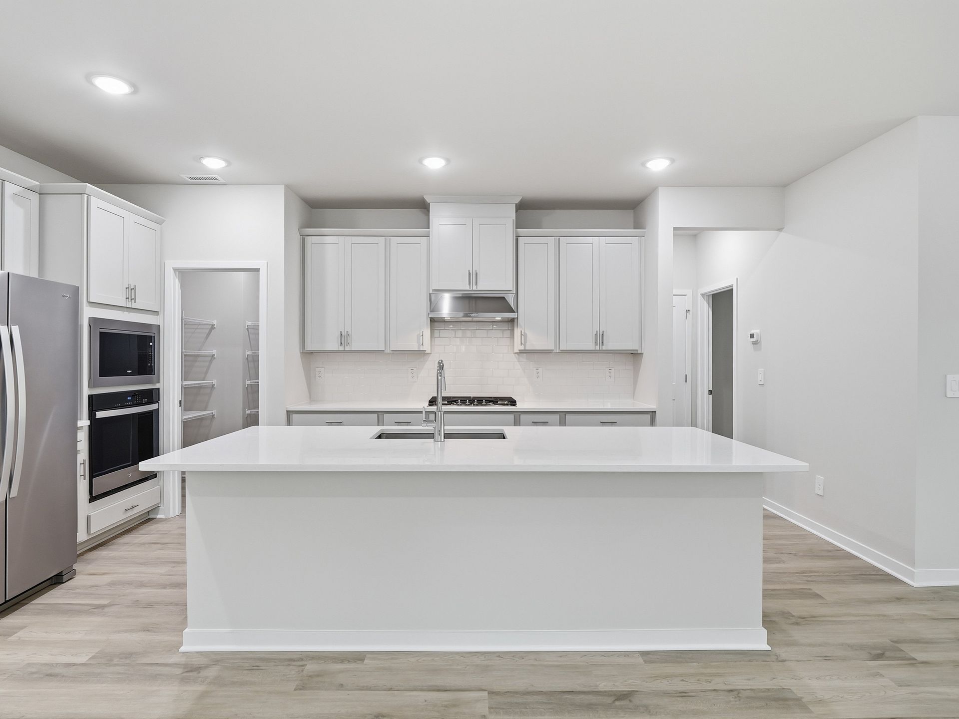 Kitchen in the Paisley floorplan at a Meritage Homes community in Clayton, NC.