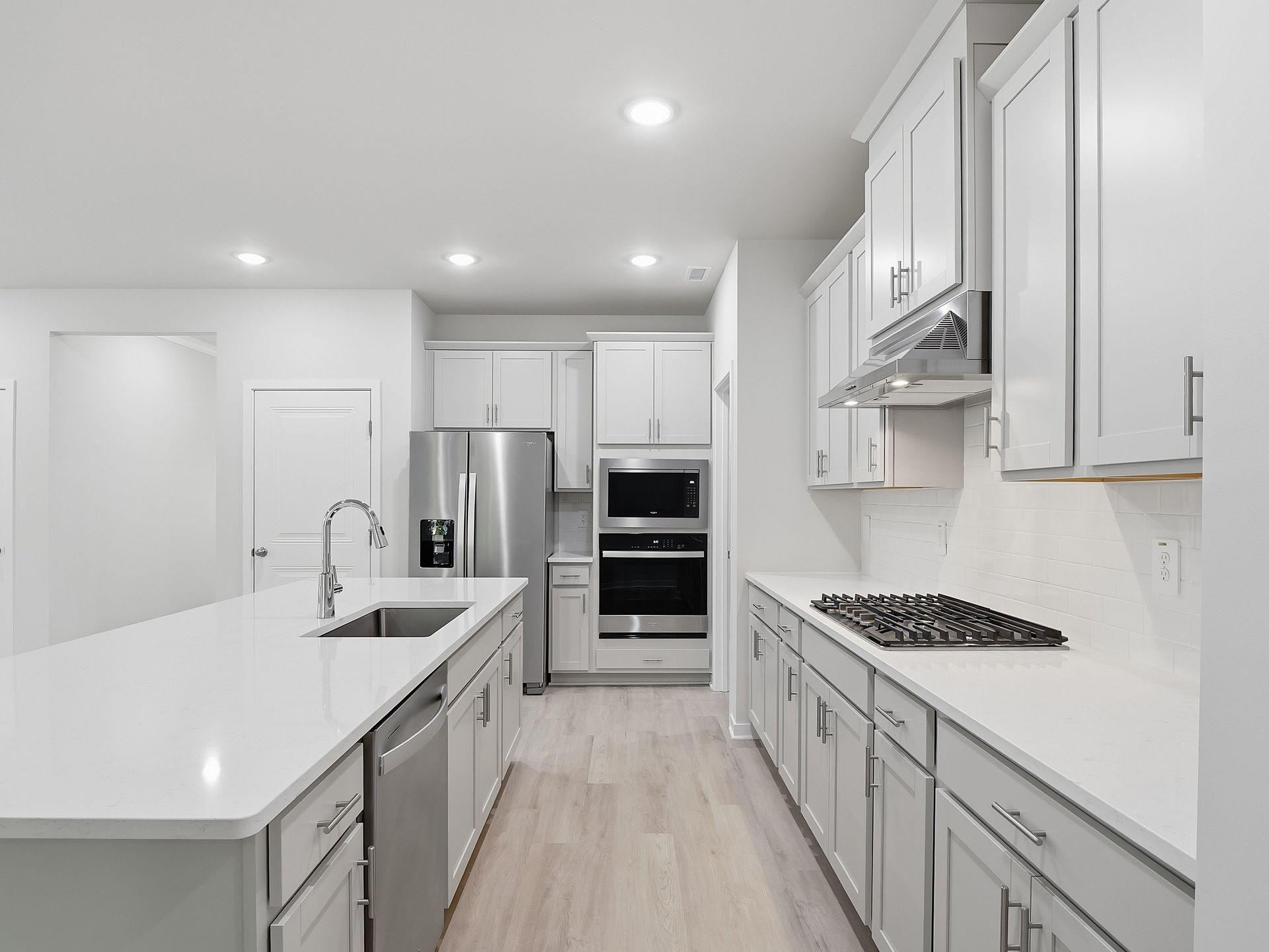 Kitchen in the Paisley floorplan at a Meritage Homes community in Clayton, NC.