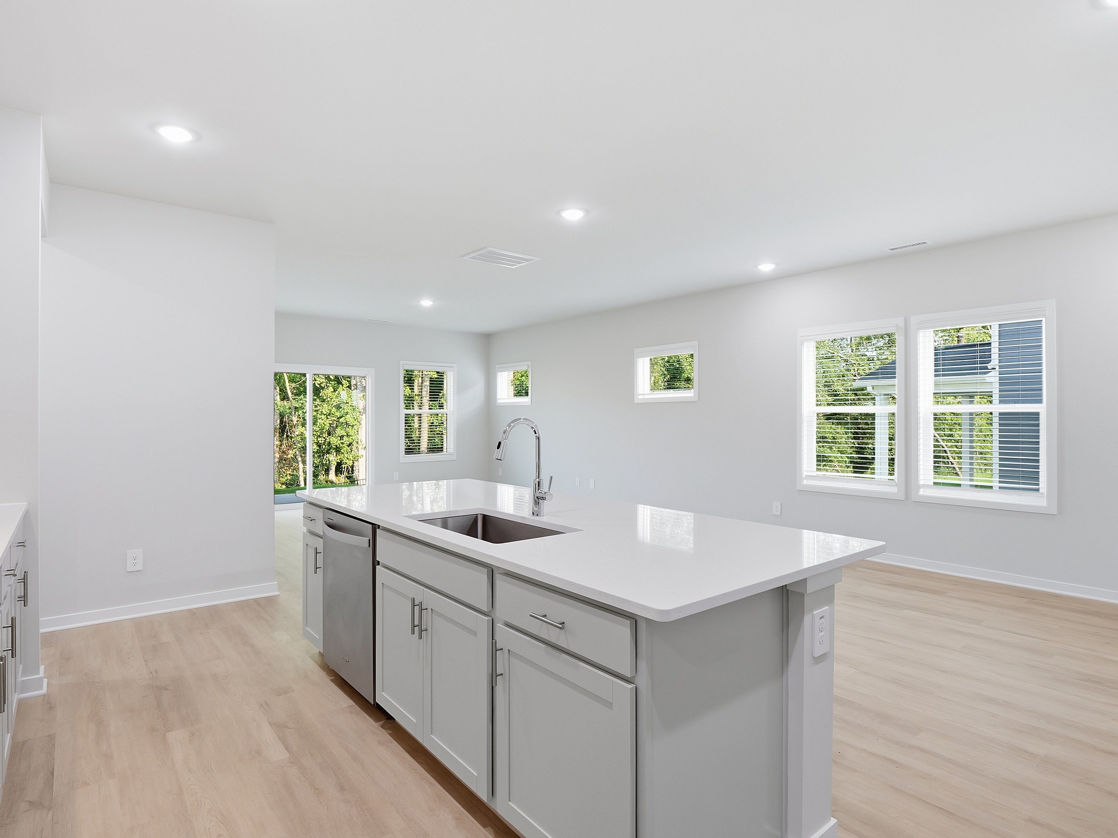 Kitchen in the Paisley floorplan at a Meritage Homes community in Clayton, NC.