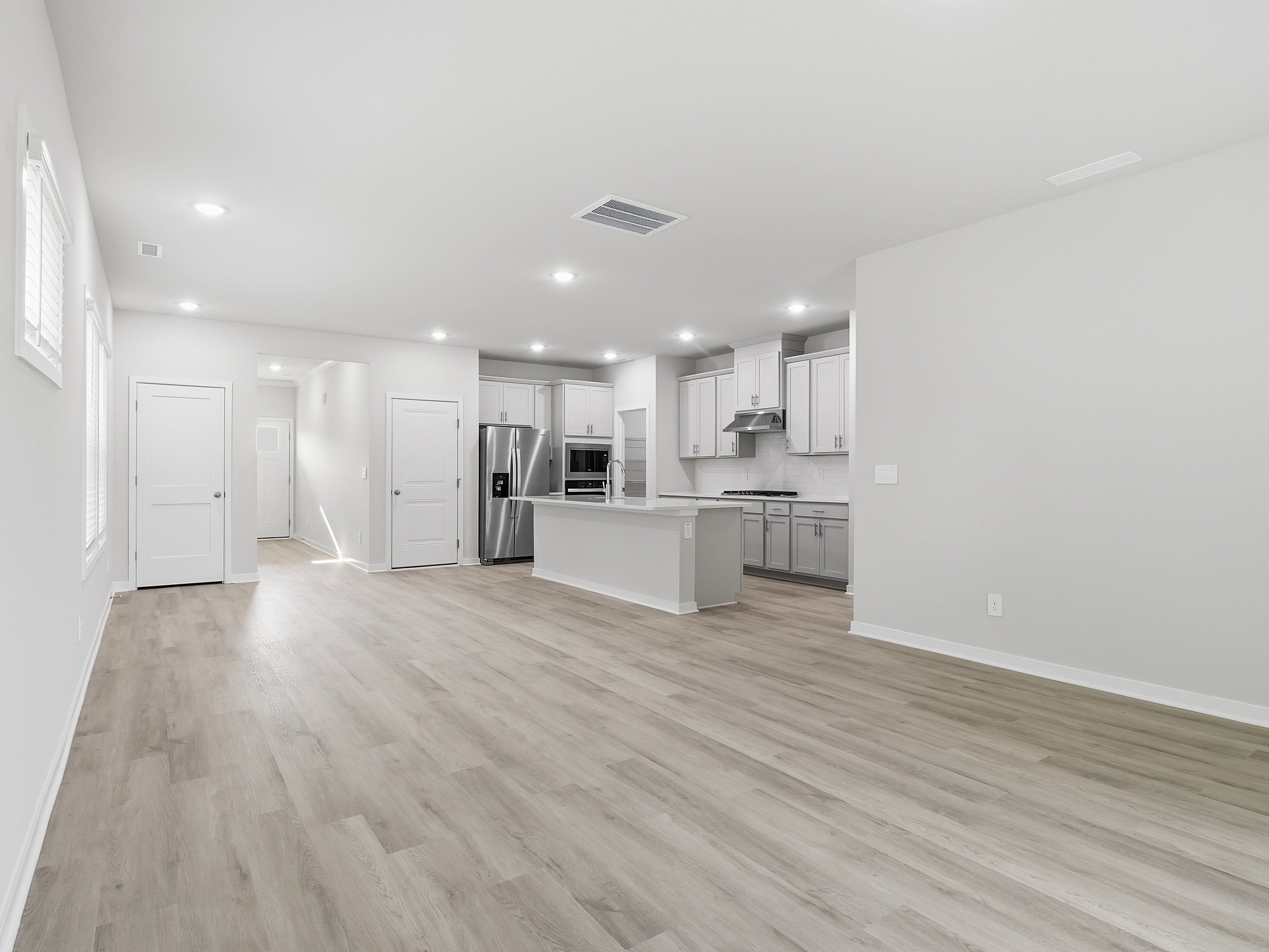 Great room in the Paisley floorplan at a Meritage Homes community in Clayton, NC.