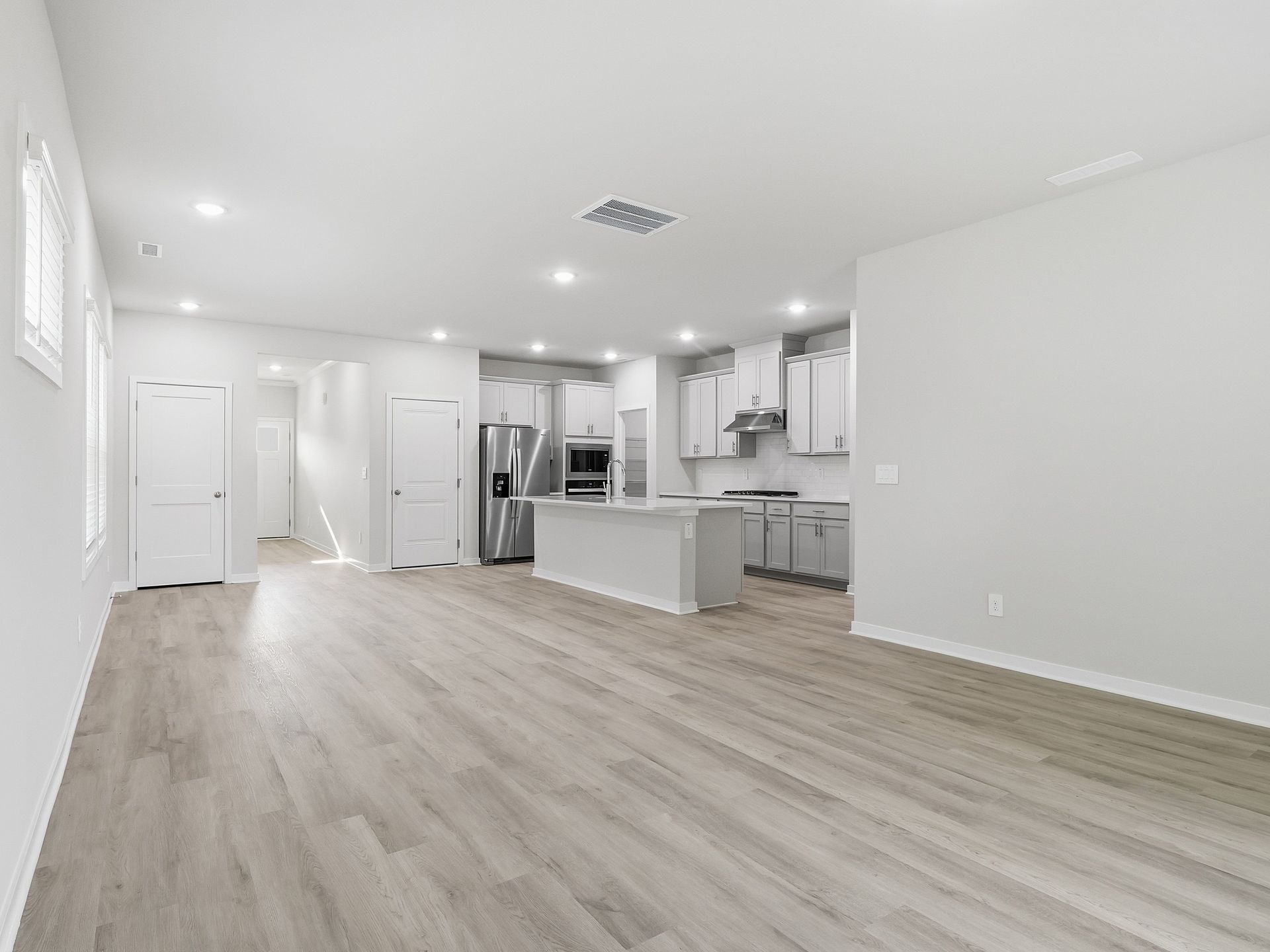 Great room in the Paisley floorplan at a Meritage Homes community in Clayton, NC.