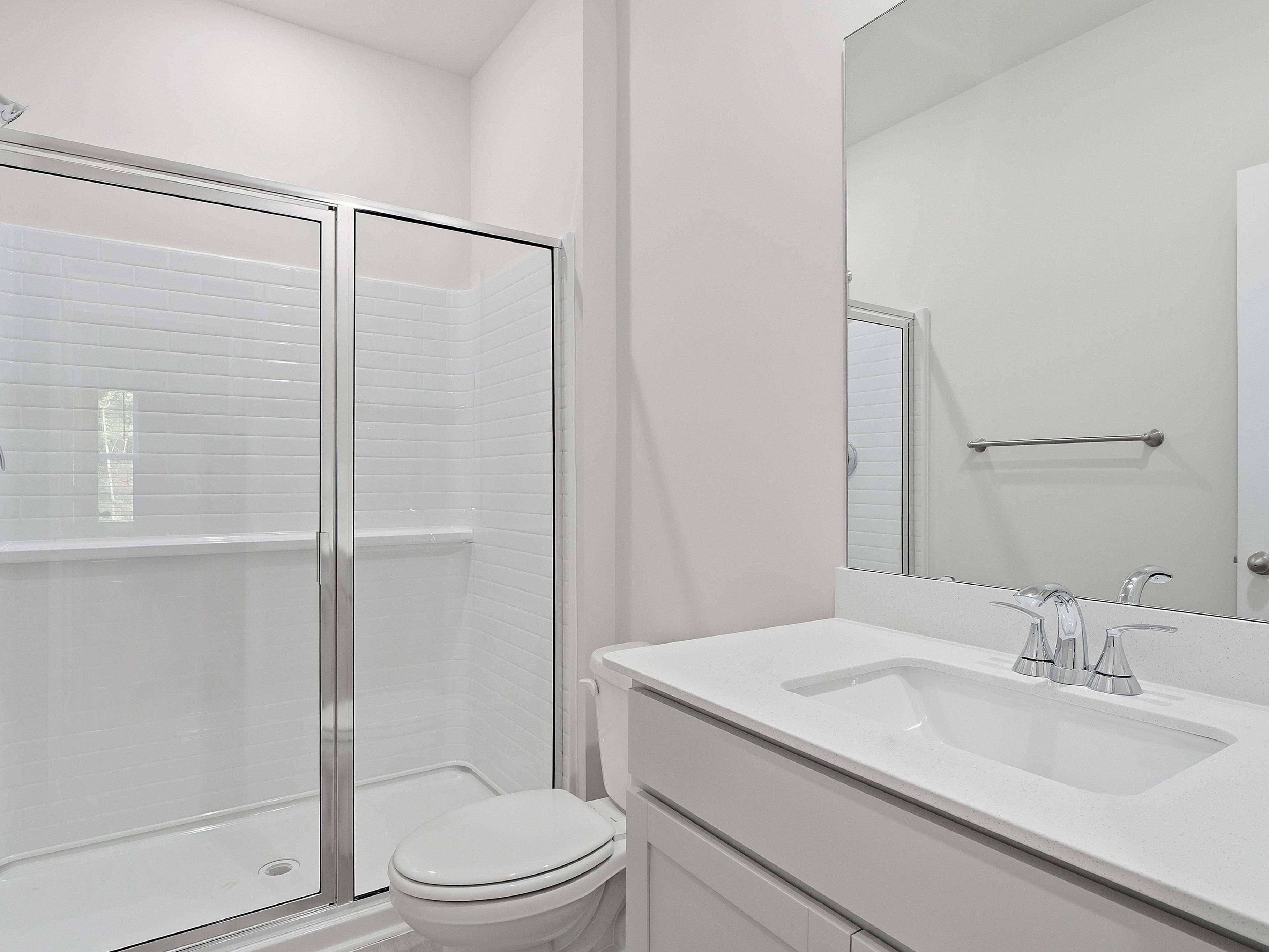 Secondary bathroom in the Paisley floorplan at a Meritage Homes community in Clayton, NC.