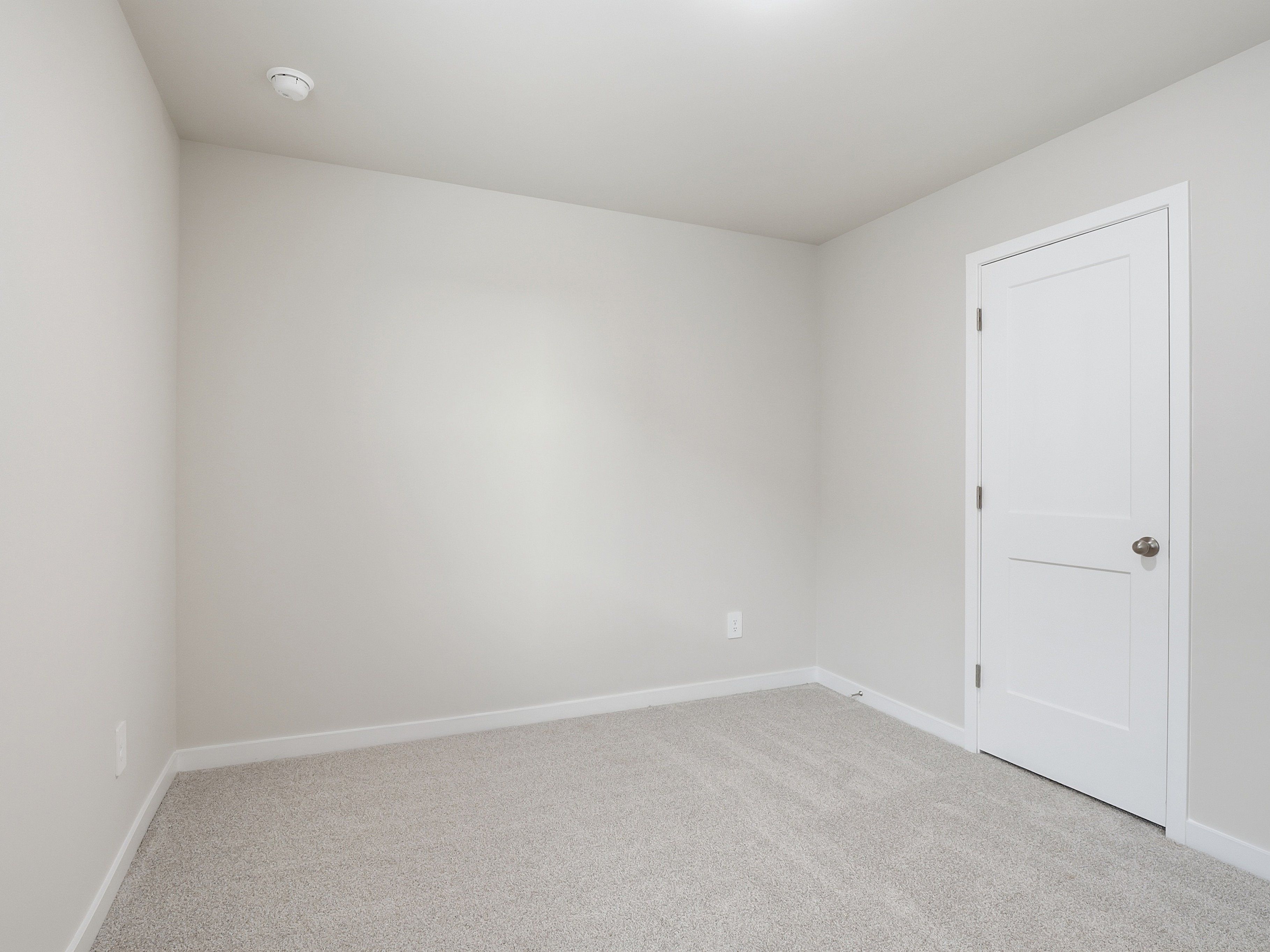 Secondary bedroom in the Paisley floorplan at a Meritage Homes community in Clayton, NC.