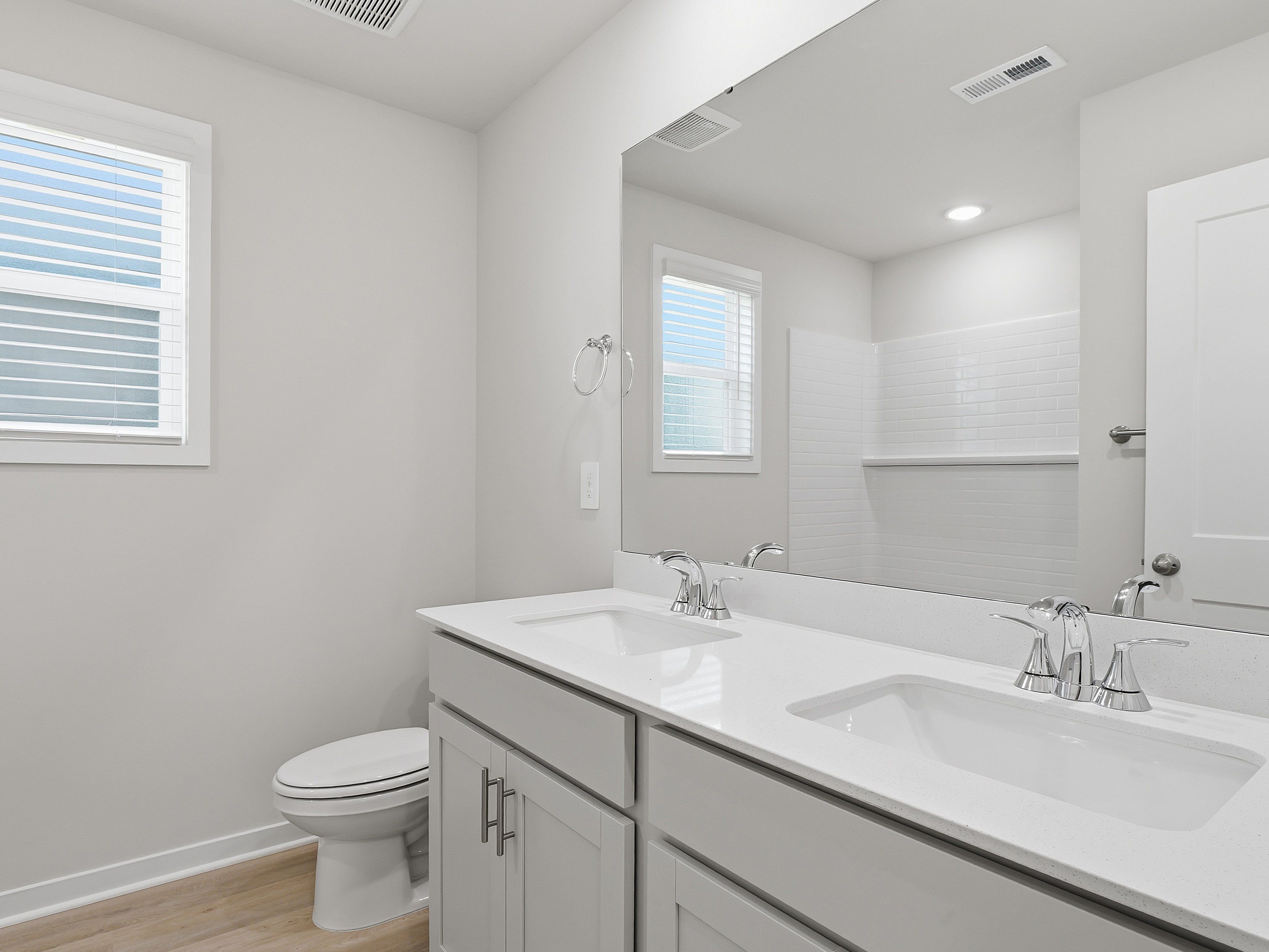 Secondary bathroom in the Paisley floorplan at a Meritage Homes community in Clayton, NC.
