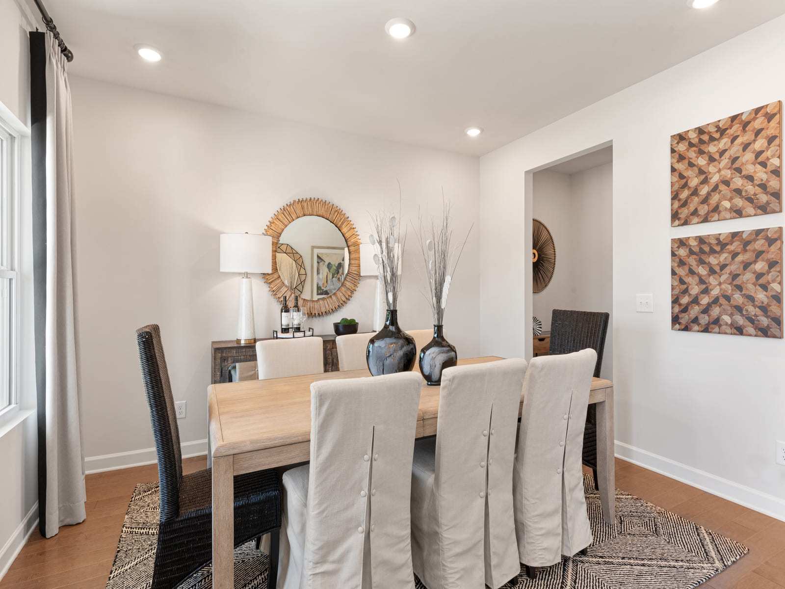 The entry of the Johnson floorplan leads to a formal dining space.