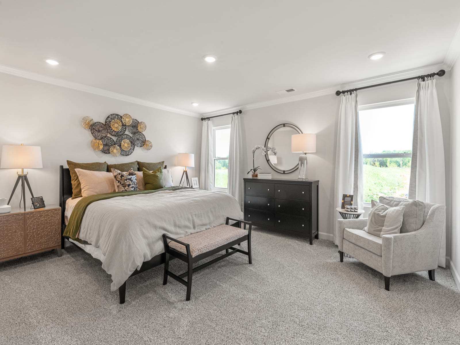 Relax and unwind in the primary bedroom.
