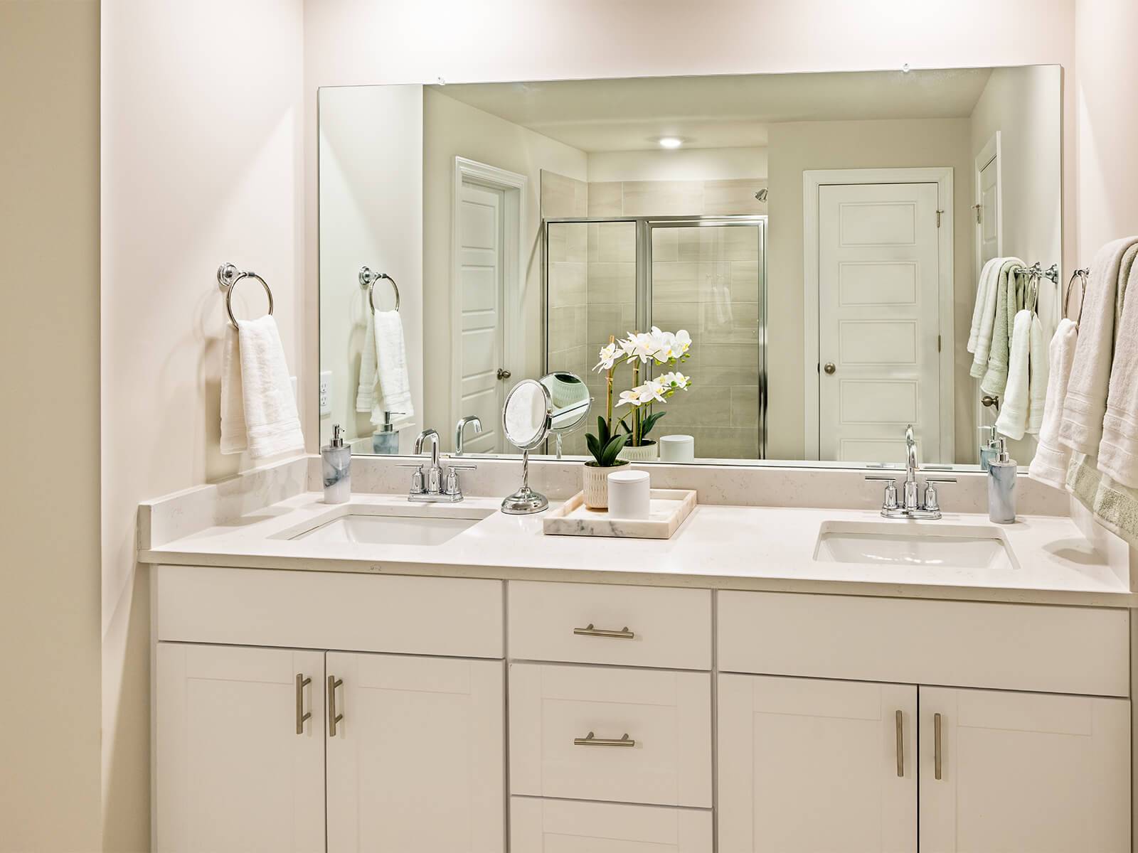 Your primary suite features a walk-in closet and a luxurious bath.