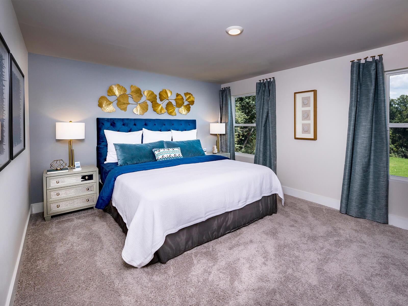 The primary suite features a walk-in closet. Photography from Townes at Garrison Grove.