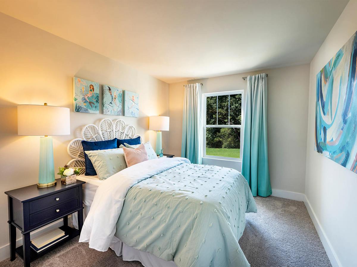 Secondary bedrooms give kids their own space to relax. Photography from Townes at Garrison Grove.