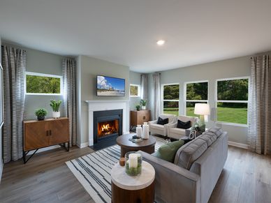Cozy up by the fireplace in the great room.