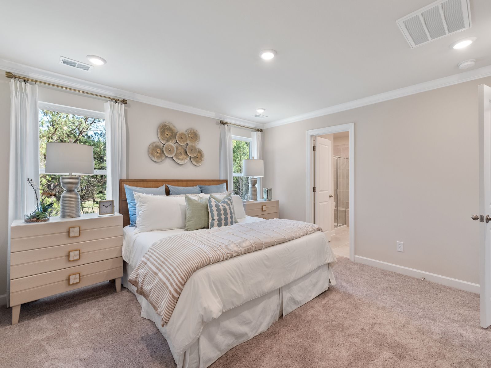 The primary bedroom connects to your personal en-suite.
