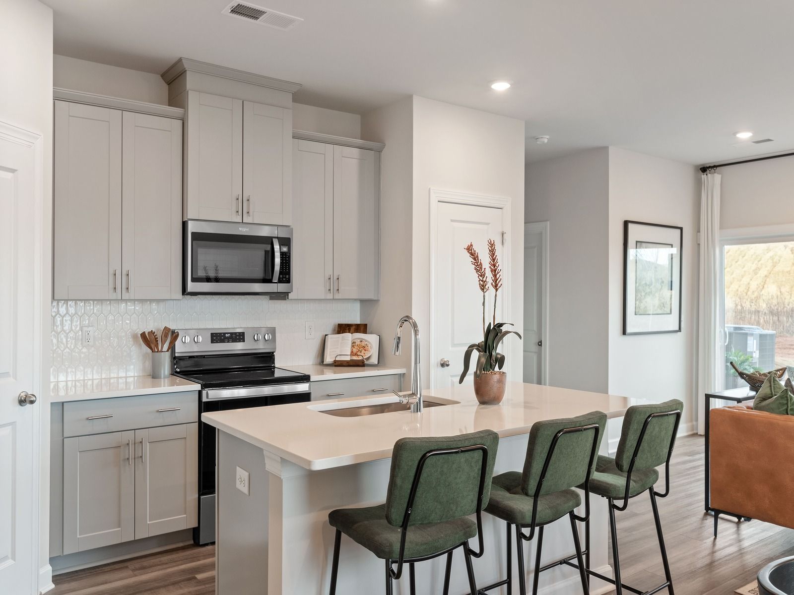 Turn the kitchen island into a functional bar counter for extra seating.