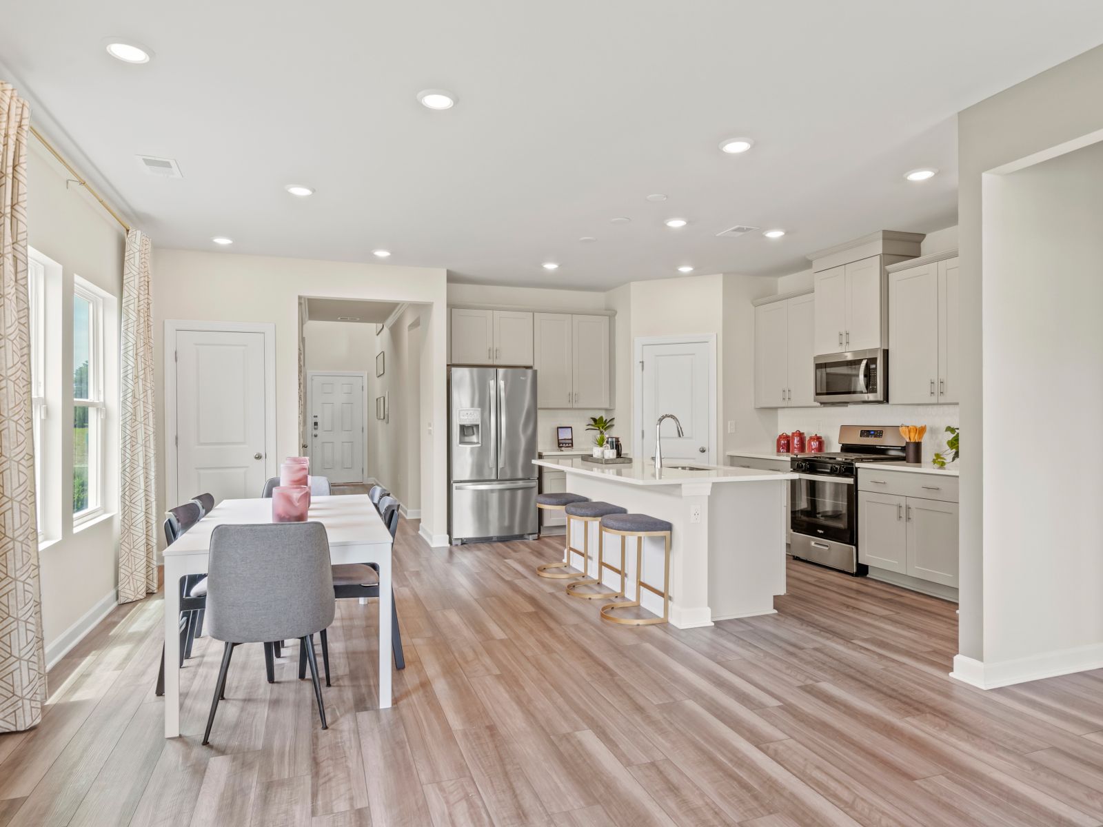 The stunning open-concept floorplan allows for easy flow between the kitchen and dining areas.