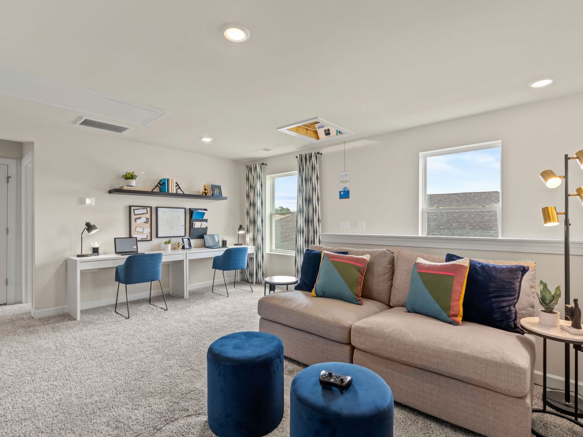 A second floor loft provides a large space to relax and unwind.