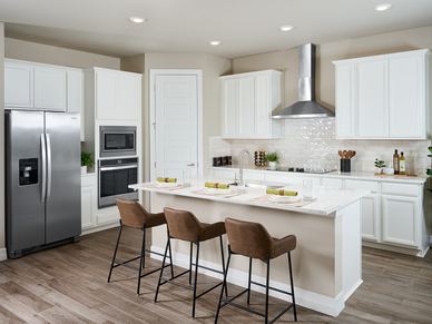 Kitchen in the Willet floorplan modeled at Crescent Lakes at Babcock Ranch