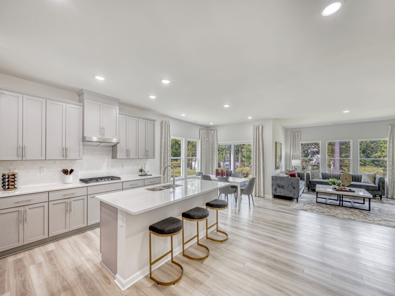 Great room in the Sherwood floorplan at a Meritage Homes community in Garner, NC.