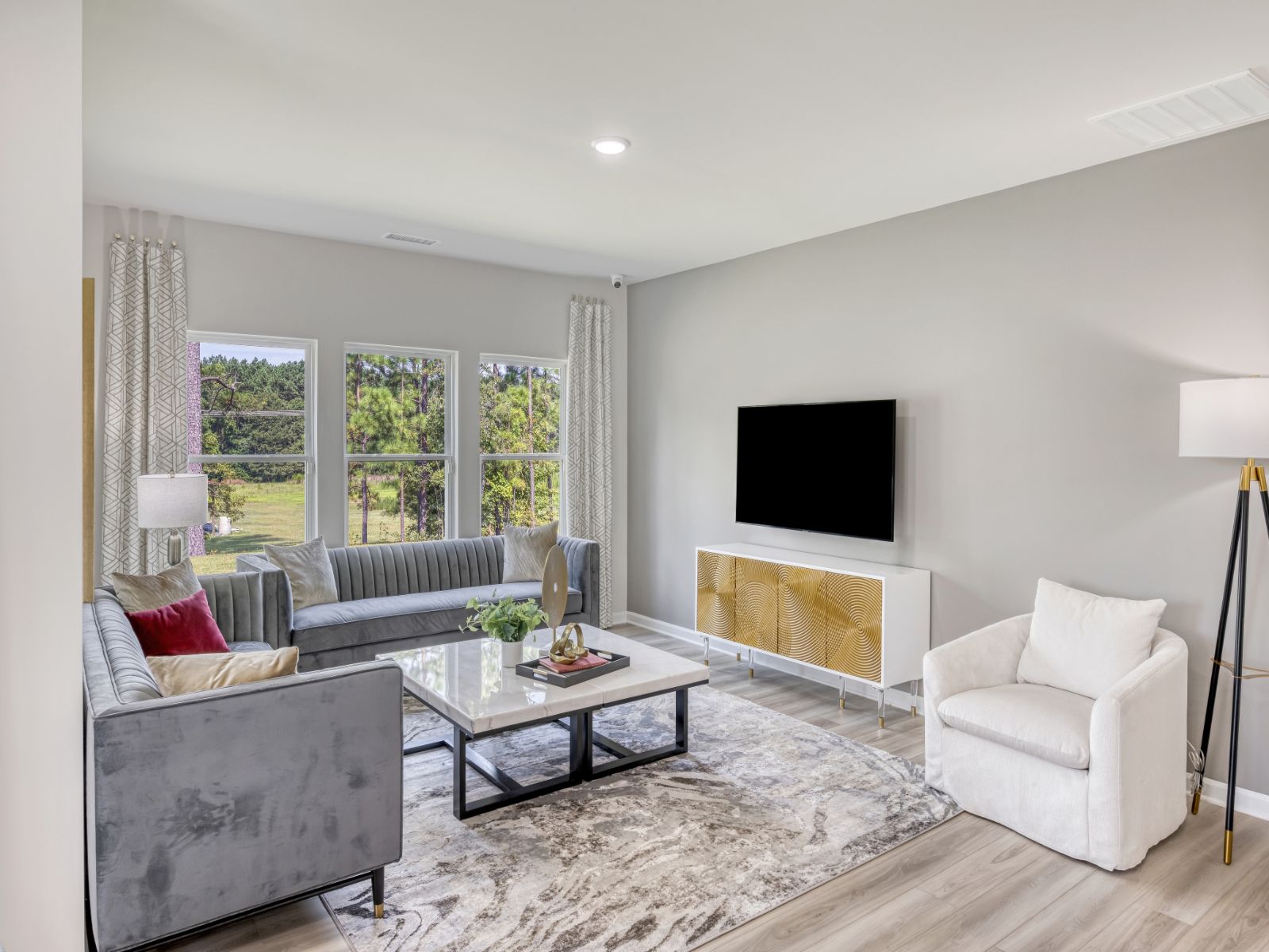 Living area in the Sherwood floorplan at a Meritage Homes community in Garner, NC.