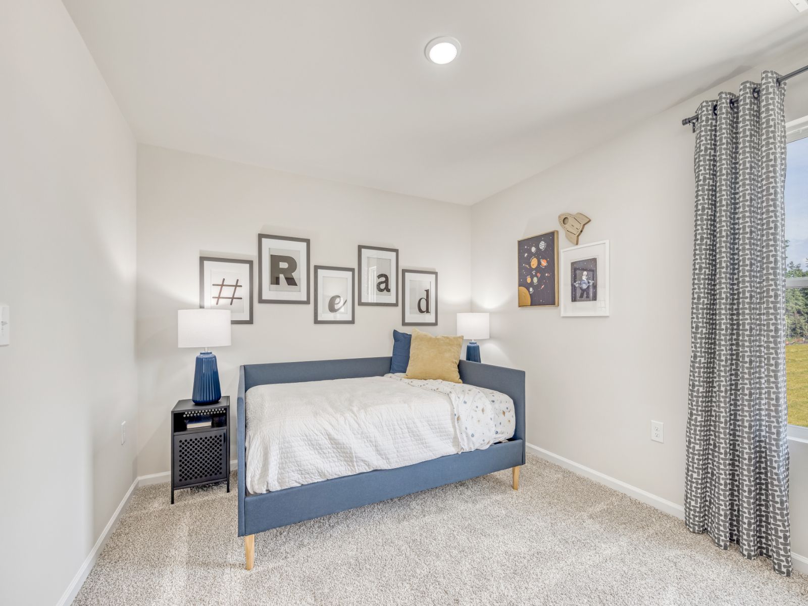 Secondary bedroom in the Sherwood floorplan at a Meritage Homes community in Garner, NC.