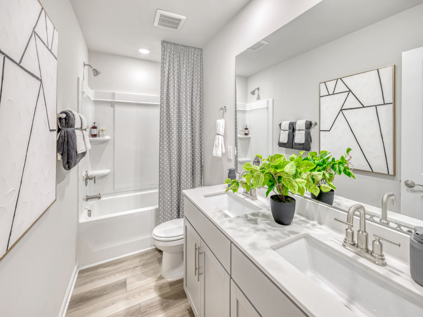 Secondary bathroom in the Sherwood floorplan at a Meritage Homes community in Garner, NC.