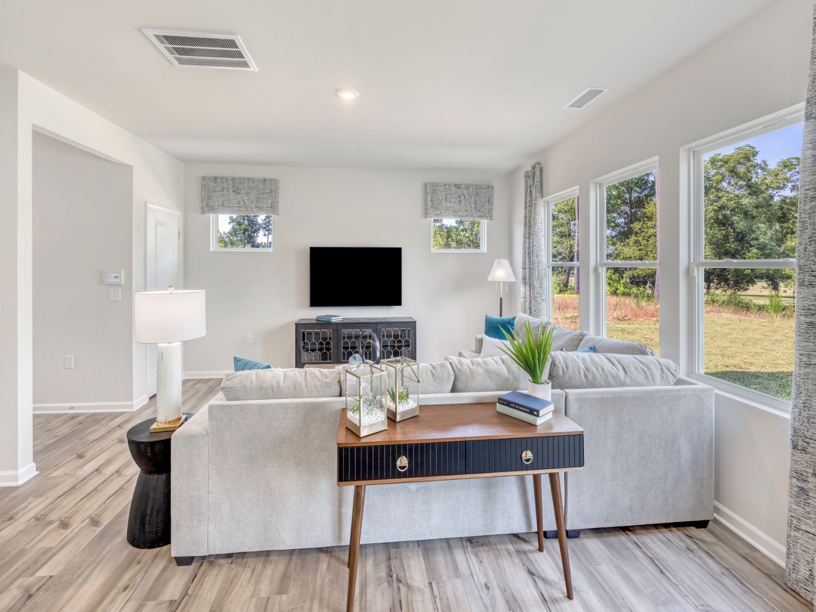Kick your feet up after a long day and unwind in the open-concept living area.