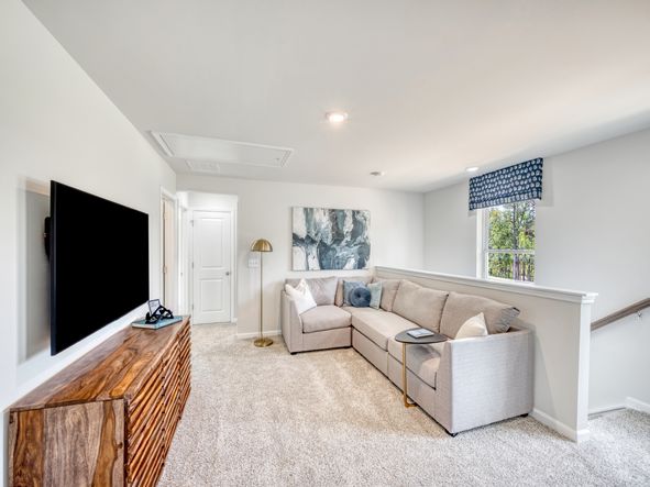 A spacious upstairs loft is ideal for your own entertainment center.