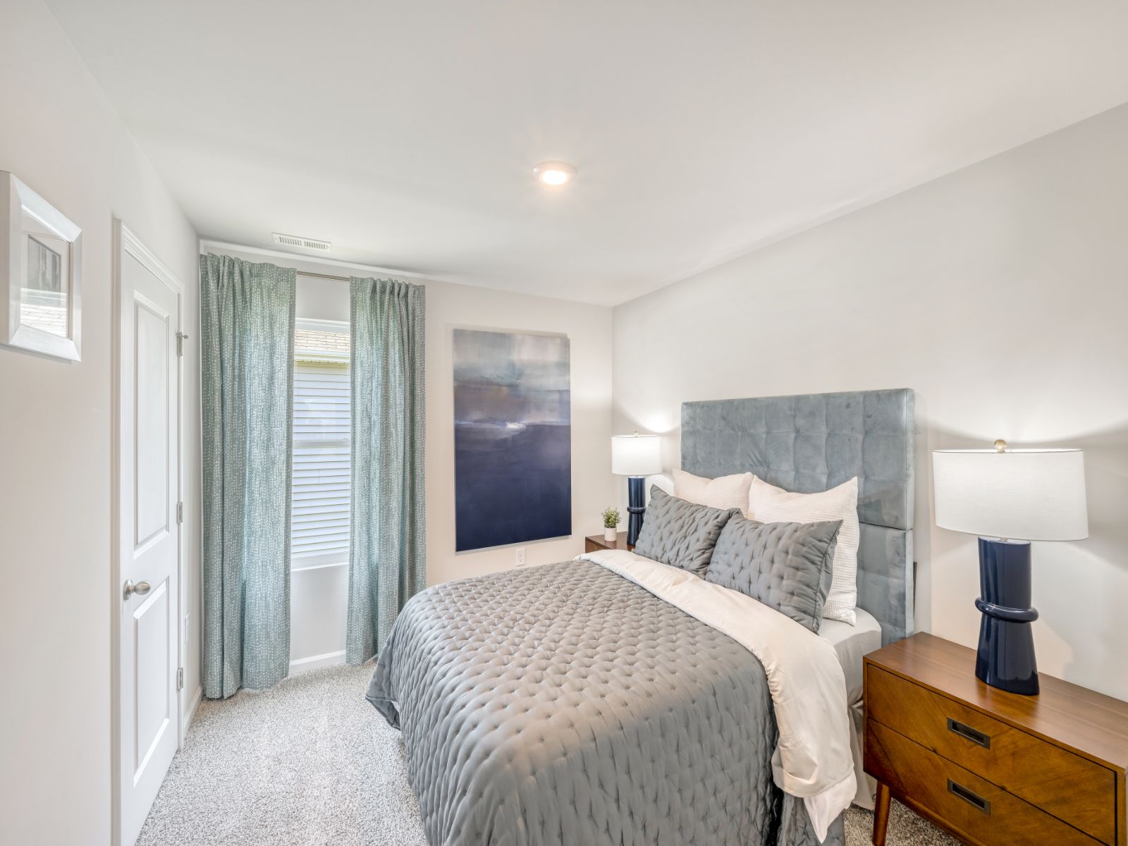 Three secondary bedrooms provide ample space for the whole family.