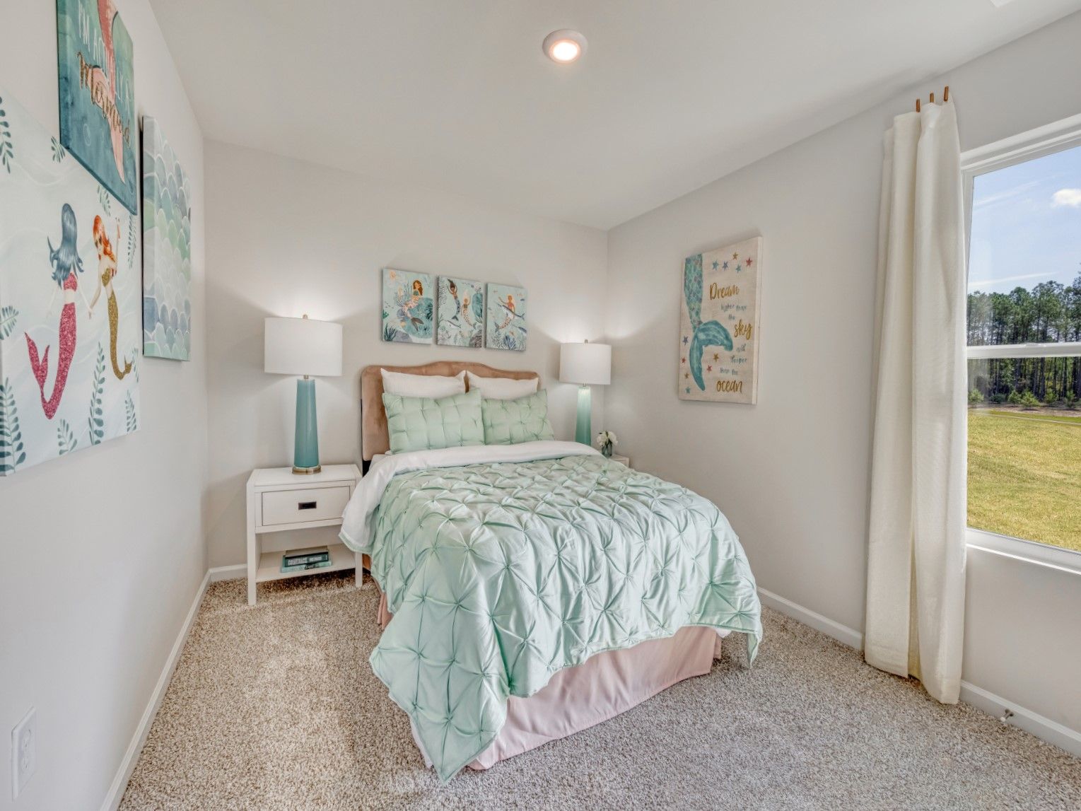 Three secondary bedrooms provide ample space for the whole family.