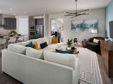 Family room in the Jade floorplan modeled at Brystol at Wylder
