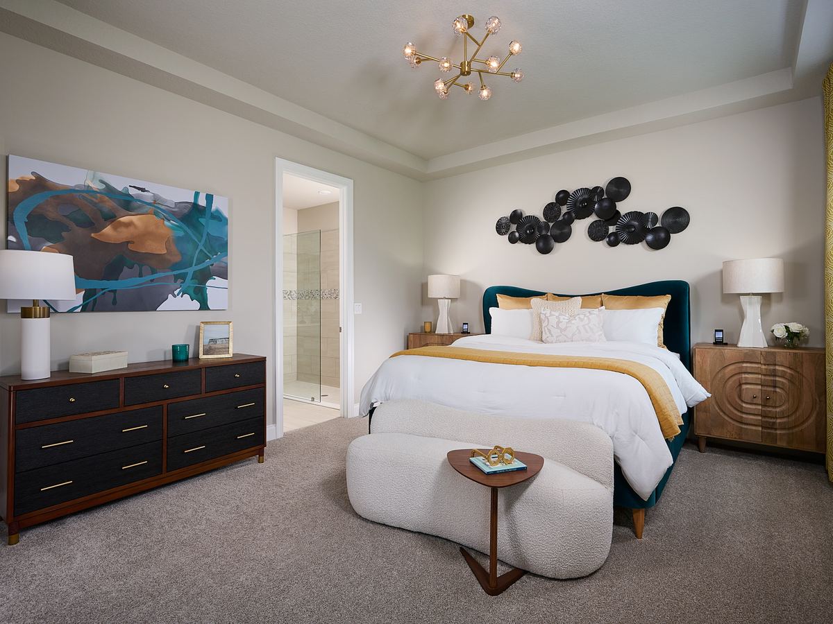 Primary bedroom in the Jade floorplan modeled at Brystol at Wylder